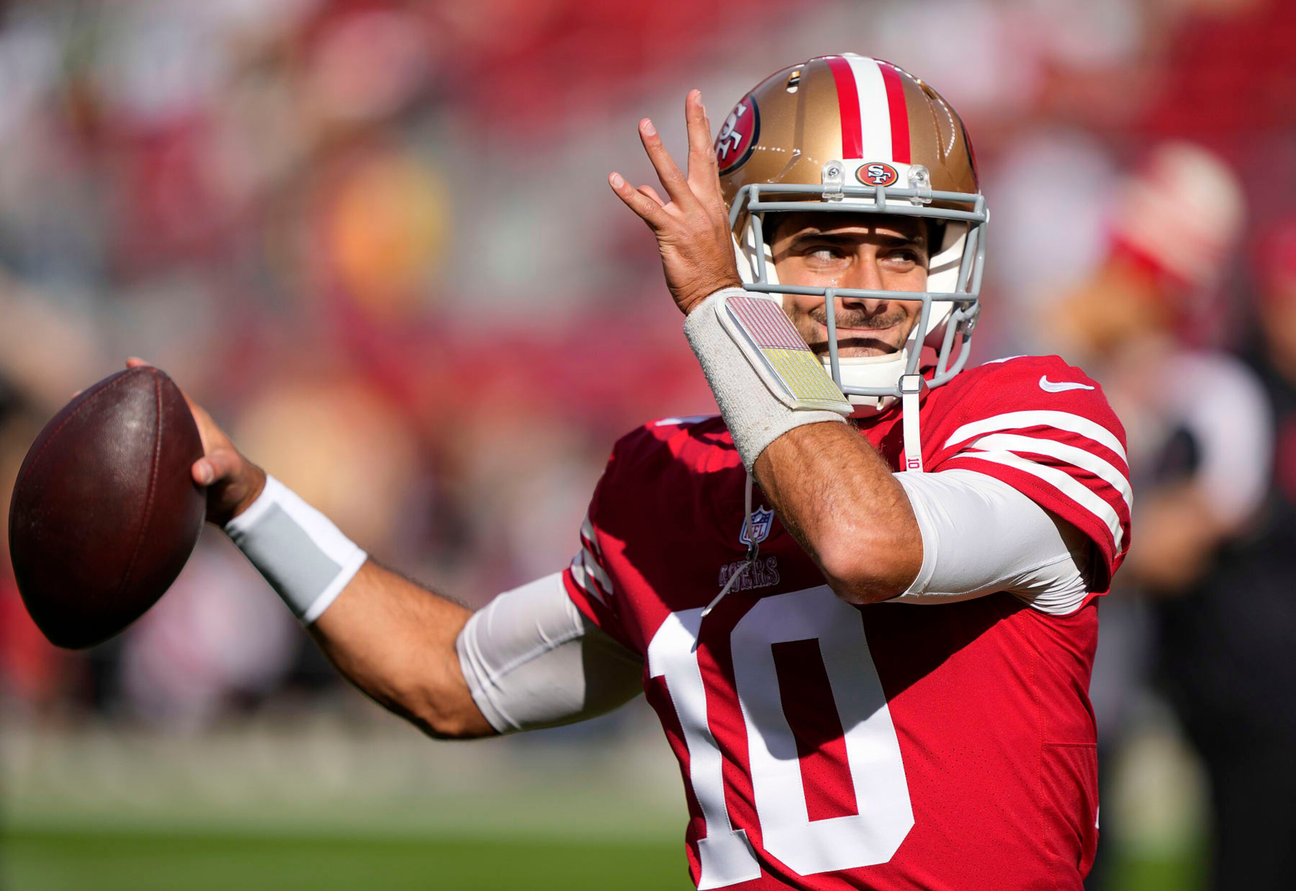 SANTA CLARA, CALIFORNIA - NOVEMBER 27: Jimmy Garoppolo #10 of the San Francisco 49ers warms up prior to the game against the New Orleans Saints at Levi's Stadium on November 27, 2022 in Santa Clara, California. (Photo by Thearon W. Henderson/Getty Images)