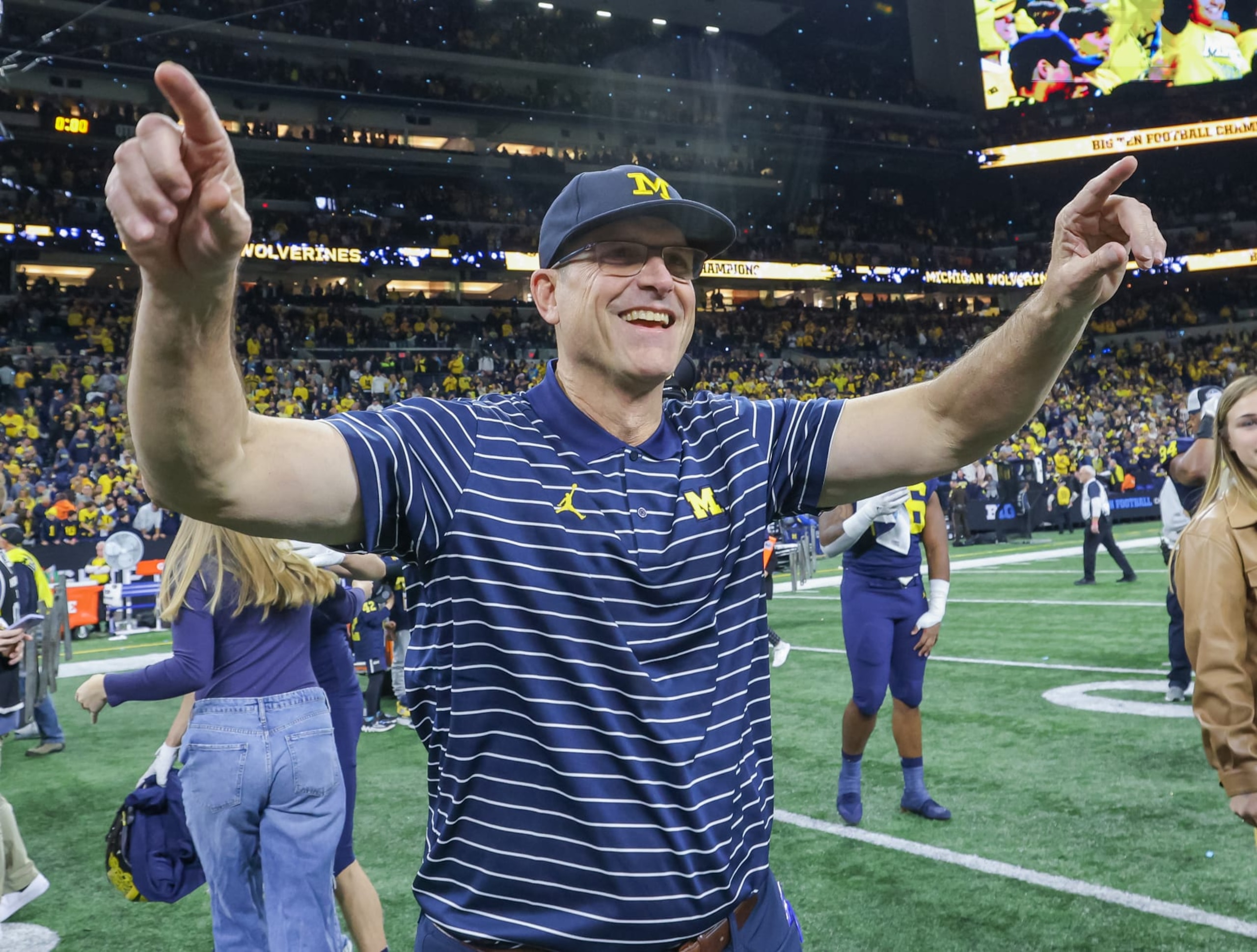 INDIANAPOLIS, IN - DECEMBER 04: Head coach Jim Harbaugh of the Michigan Wolverines celebrates following the game against the Purdue Boilermakers in the Big Ten Championship at Lucas Oil Stadium on December 4, 2022 in Indianapolis, Indiana. (Photo by Michael Hickey/Getty Images)