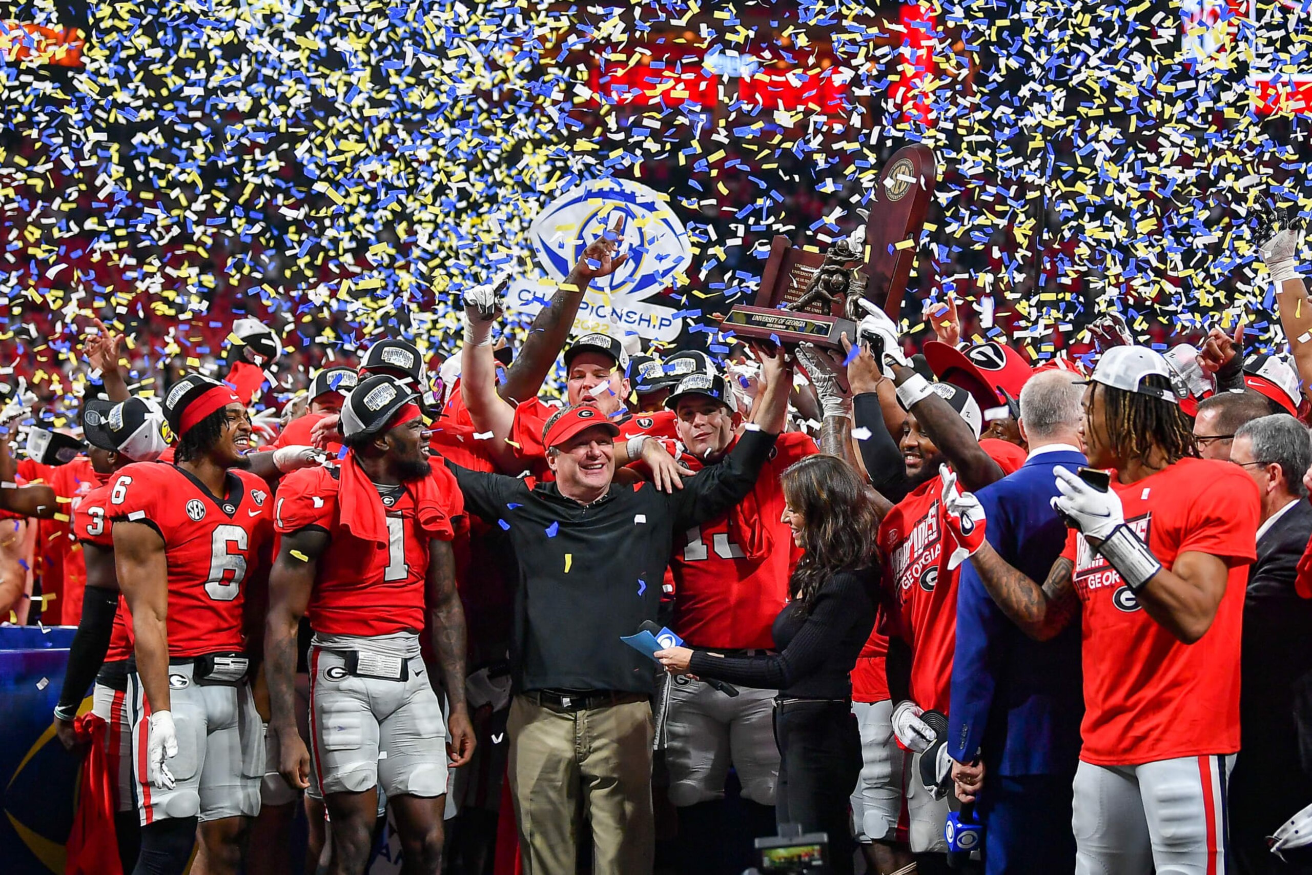 ATLANTA, GA DECEMBER 03: Georgia head coach Kirby Smart and players celebrate after winning the SEC Championship football game between the LSU Tigers and the Georgia Bulldogs on December 3rd, 2022 at Mercedes-Benz Stadium in Atlanta, GA. (Photo by Rich von Biberstein/Icon Sportswire via Getty Images) ATLANTA, GA DECEMBER 03: Georgia head coach Kirby Smart and players celebrate after winning the SEC Championship football game between the LSU Tigers and the Georgia Bulldogs on December 3rd, 2022 at Mercedes-Benz Stadium in Atlanta, GA. (Photo by Rich von Biberstein/Icon Sportswire via Getty Images)
