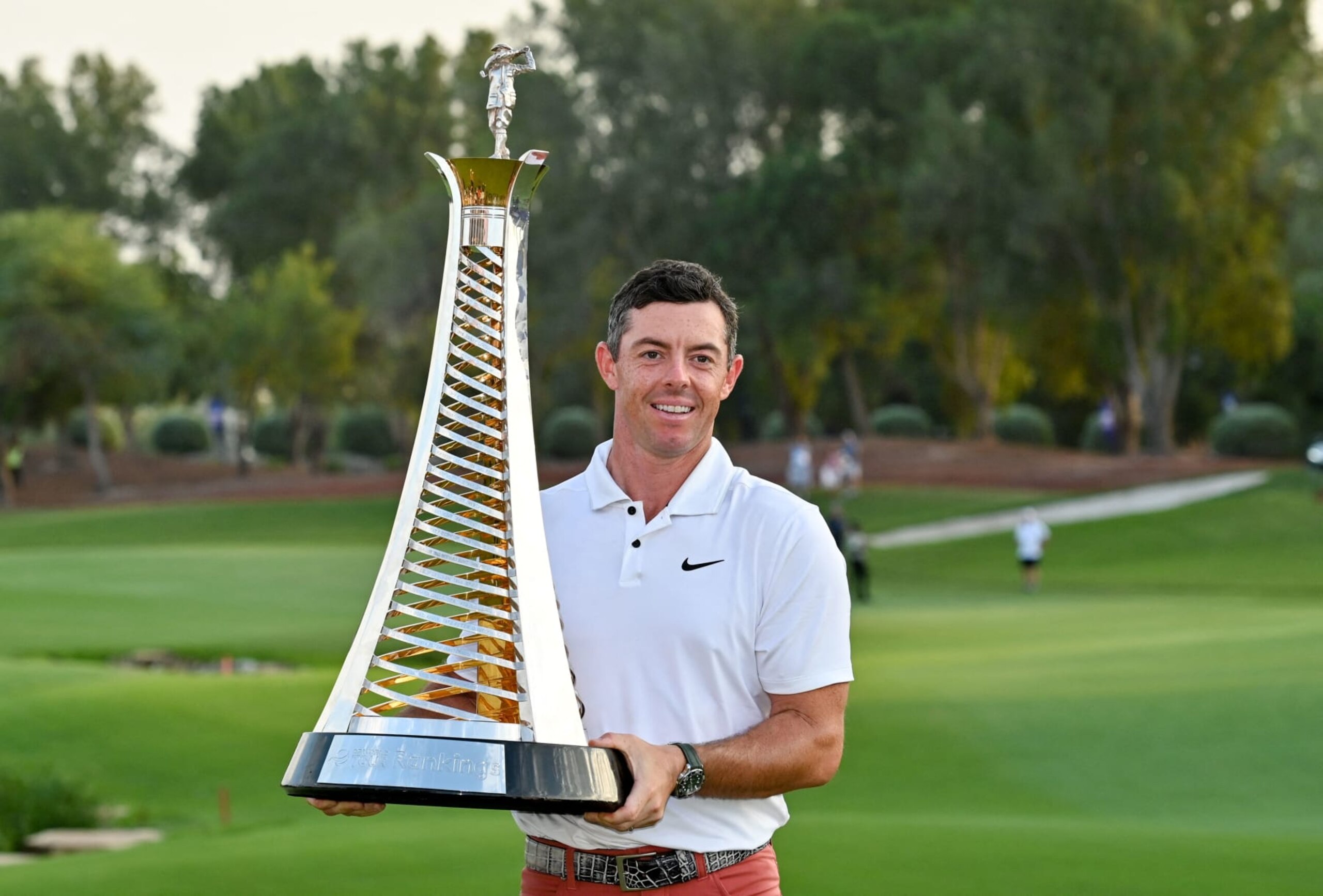 Rory McIlroy of Northern Ireland poses with the DP World Tour Championship trophy during final round of the DP World Tour Championship at Jumeirah Golf Estates in Dubai on November 20,2022. (Photo by Ryan LIM / AFP) (Photo by RYAN LIM/AFP via Getty Images)