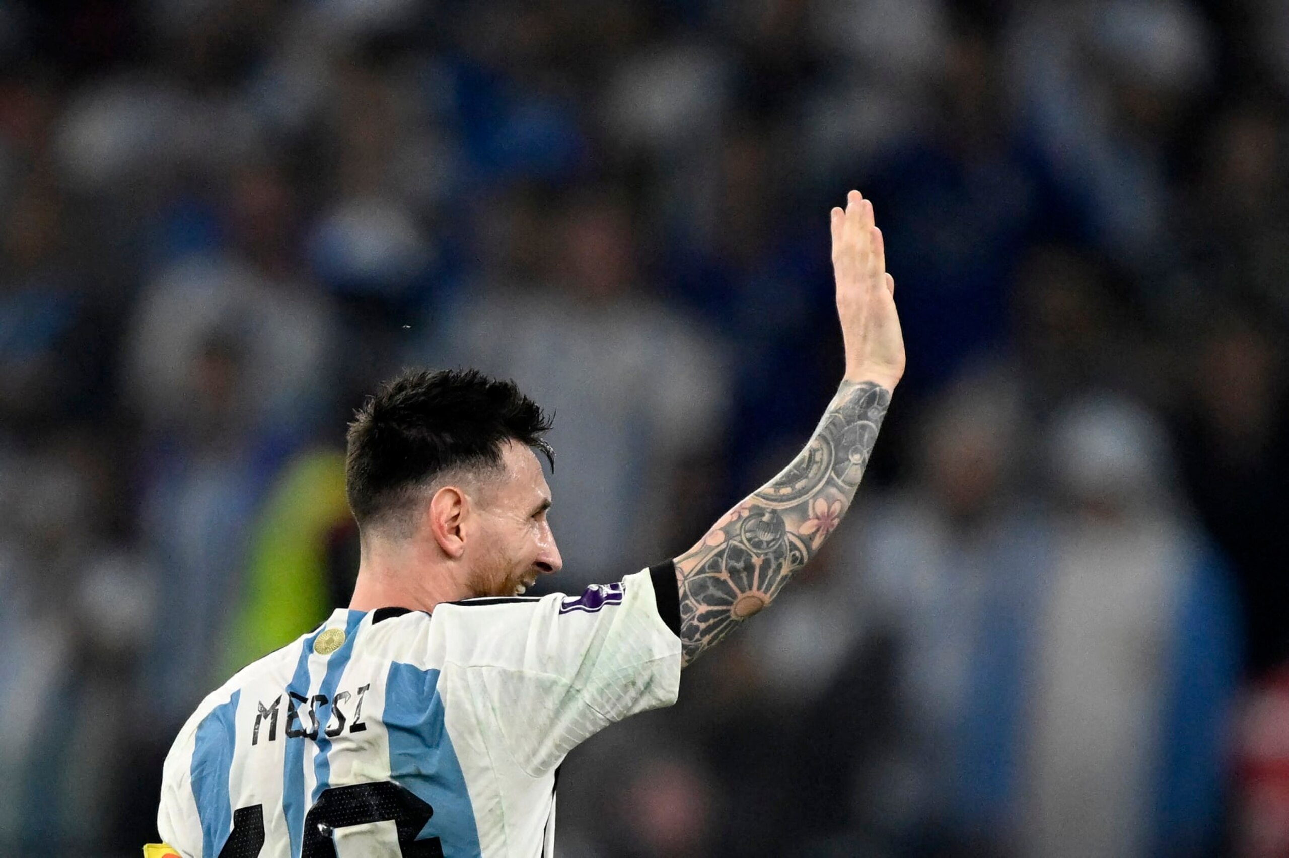 Argentina's forward #10 Lionel Messi waves after his team won the Qatar 2022 World Cup round of 16 football match between Argentina and Australia at the Ahmad Bin Ali Stadium in Al-Rayyan, west of Doha on December 3, 2022. (Photo by Alfredo ESTRELLA / AFP) (Photo by ALFREDO ESTRELLA/AFP via Getty Images)