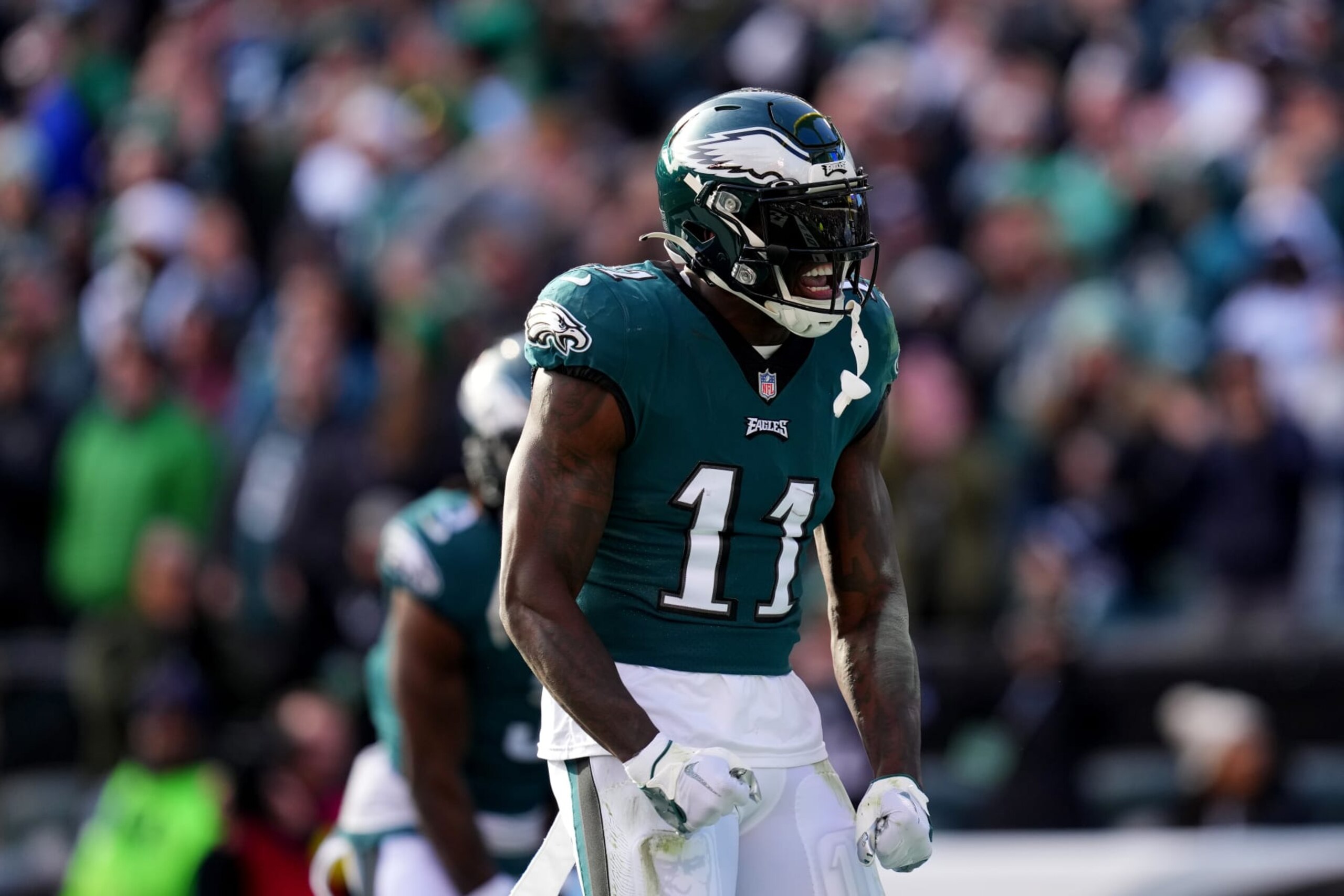 PHILADELPHIA, PENNSYLVANIA - DECEMBER 04: A.J. Brown #11 of the Philadelphia Eagles reacts after scoring touchdown in the second quarter of a game against the Tennessee Titans at Lincoln Financial Field on December 04, 2022 in Philadelphia, Pennsylvania. (Photo by Mitchell Leff/Getty Images)