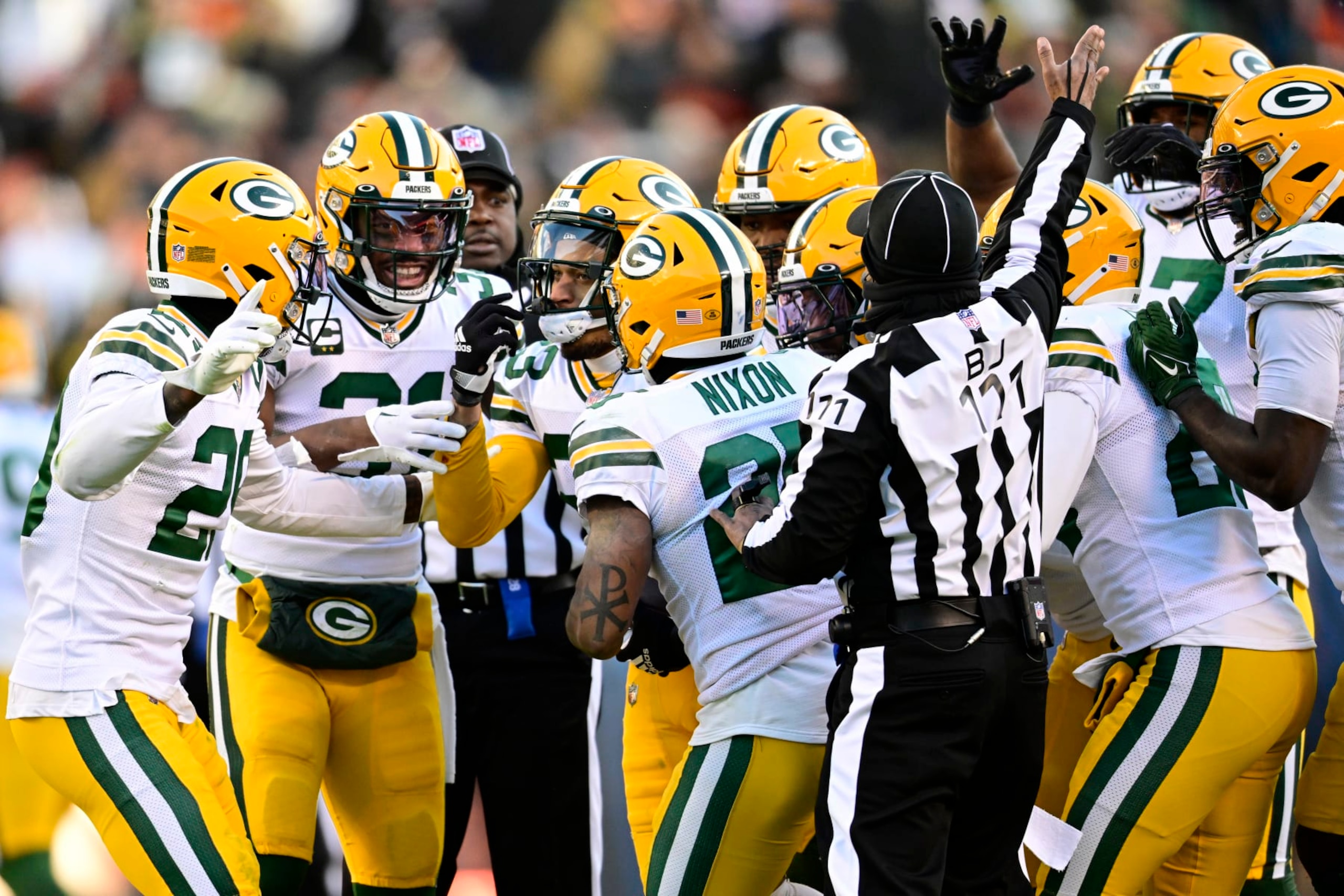 CHICAGO, ILLINOIS - DECEMBER 04: Jaire Alexander #23 of the Green Bay Packers reacts with teammates after an interception during the fourth quarter of the game against the Chicago Bears at Soldier Field on December 04, 2022 in Chicago, Illinois. (Photo by Quinn Harris/Getty Images) CHICAGO, ILLINOIS - DECEMBER 04: Jaire Alexander #23 of the Green Bay Packers reacts with teammates after an interception during the fourth quarter of the game against the Chicago Bears at Soldier Field on December 04, 2022 in Chicago, Illinois. (Photo by Quinn Harris/Getty Images)