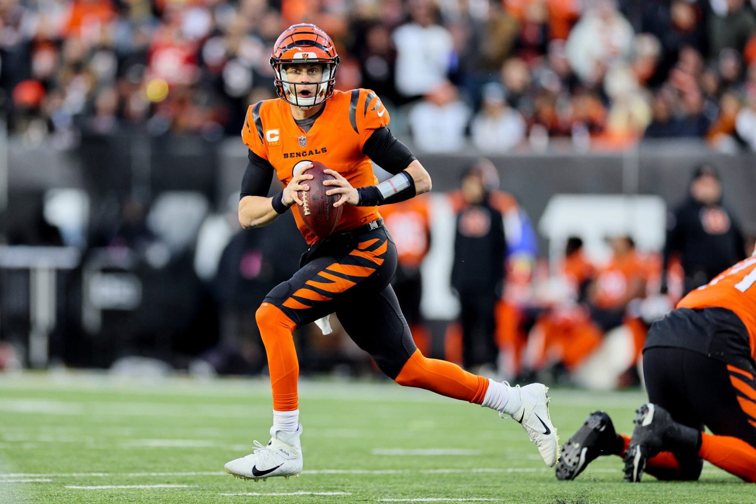 CINCINNATI, OHIO - DECEMBER 04: Joe Burrow #9 of the Cincinnati Bengals looks to pass against the Kansas City Chiefs during the first half at Paycor Stadium on December 04, 2022 in Cincinnati, Ohio. (Photo by Andy Lyons/Getty Images)