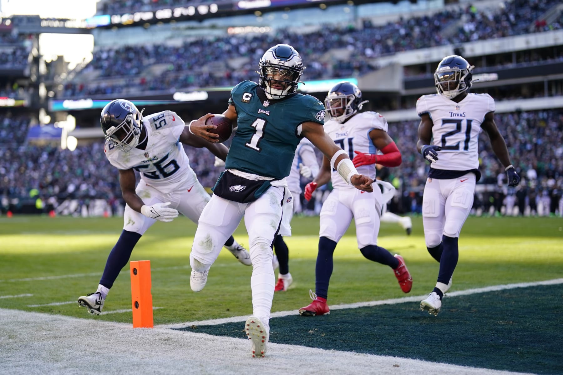 Philadelphia Eagles' Jalen Hurts runs the ball in for a touchdown during the first half of an NFL football game against the Tennessee Titans, Sunday, Dec. 4, 2022, in Philadelphia. (AP Photo/Matt Rourke)
