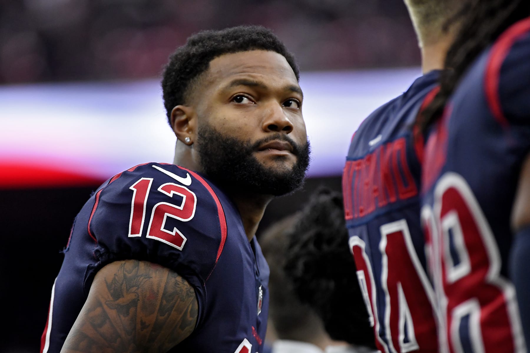 HOUSTON, TEXAS - DECEMBER 04: Nico Collins #12 of the Houston Texans looks onward during pregame against the Cleveland Browns at NRG Stadium on December 04, 2022 in Houston, Texas. (Photo by Logan Riely/Getty Images)