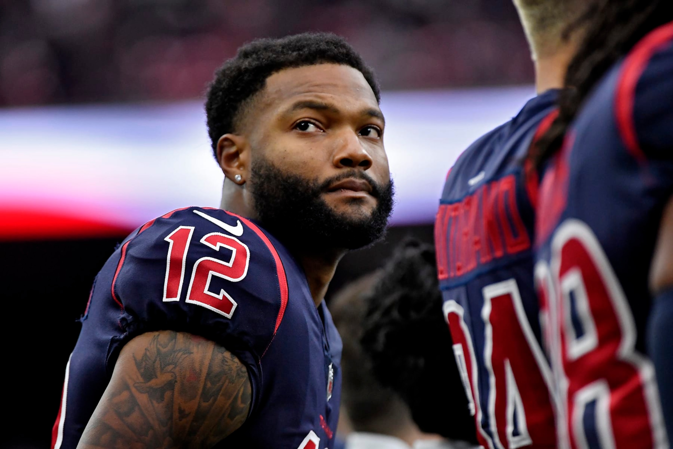 HOUSTON, TEXAS - DECEMBER 04: Nico Collins #12 of the Houston Texans looks onward during pregame against the Cleveland Browns at NRG Stadium on December 04, 2022 in Houston, Texas. (Photo by Logan Riely/Getty Images)
