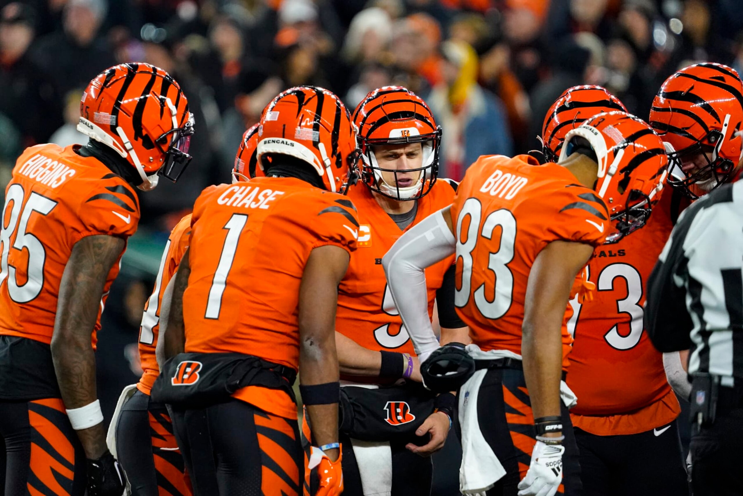 Cincinnati Bengals quarterback Joe Burrow (9) huddle with his team as they played against the Kansas City Chiefs in the first half of an NFL football game in Cincinnati, Sunday, Dec. 4, 2022. (AP Photo/Joshua Bickel)