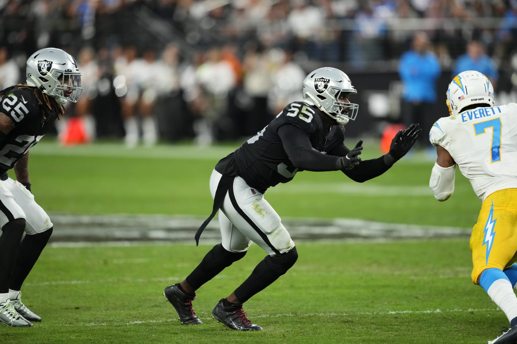 Las Vegas Raiders defensive end Chandler Jones (55) rushes off the line against Los Angeles Chargers tight end Gerald Everett (7) during the second half of an NFL football game, Sunday, Dec. 4, 2022, in Las Vegas. (AP Photo/Matt York)