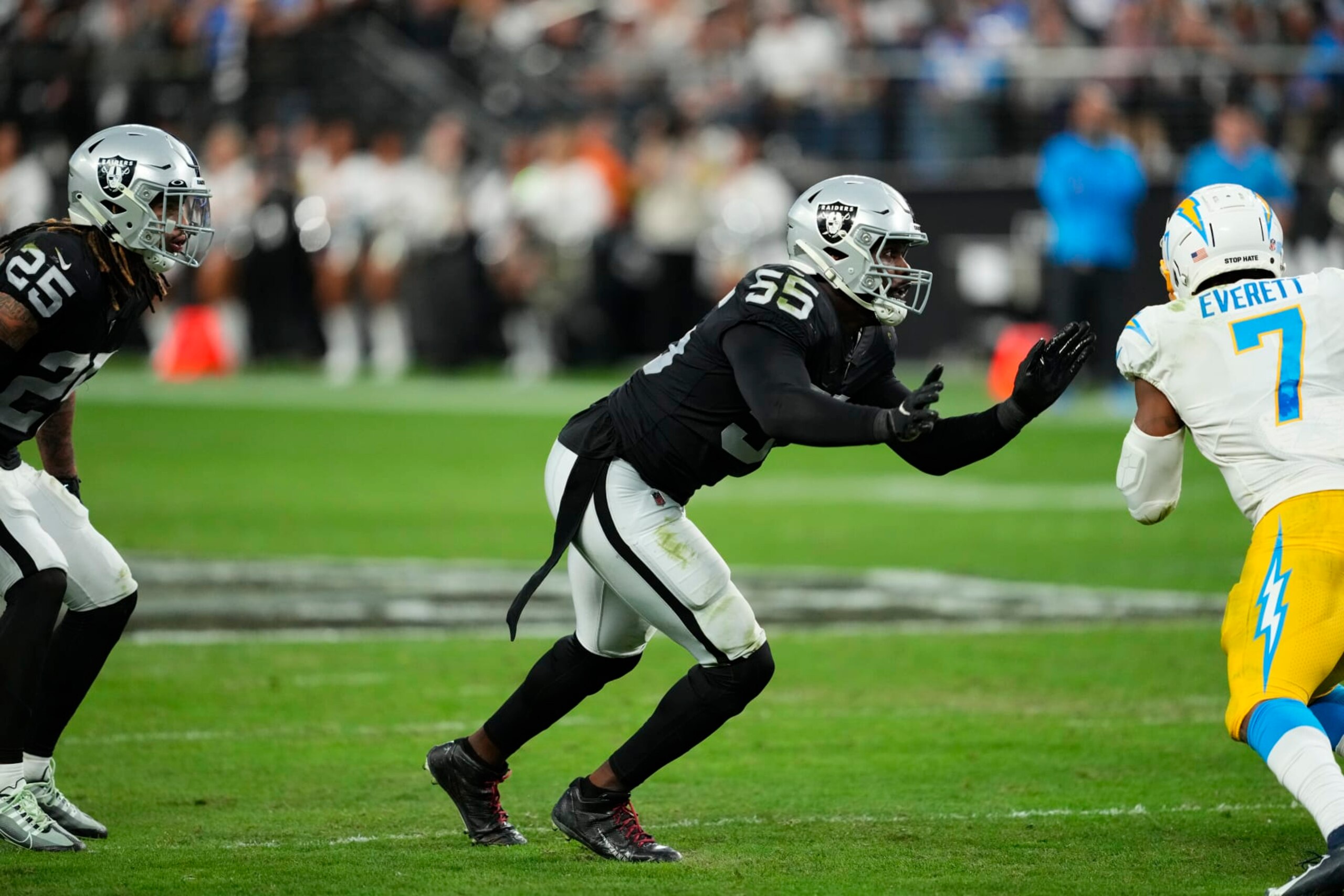 Las Vegas Raiders defensive end Chandler Jones (55) rushes off the line against Los Angeles Chargers tight end Gerald Everett (7) during the second half of an NFL football game, Sunday, Dec. 4, 2022, in Las Vegas. (AP Photo/Matt York)