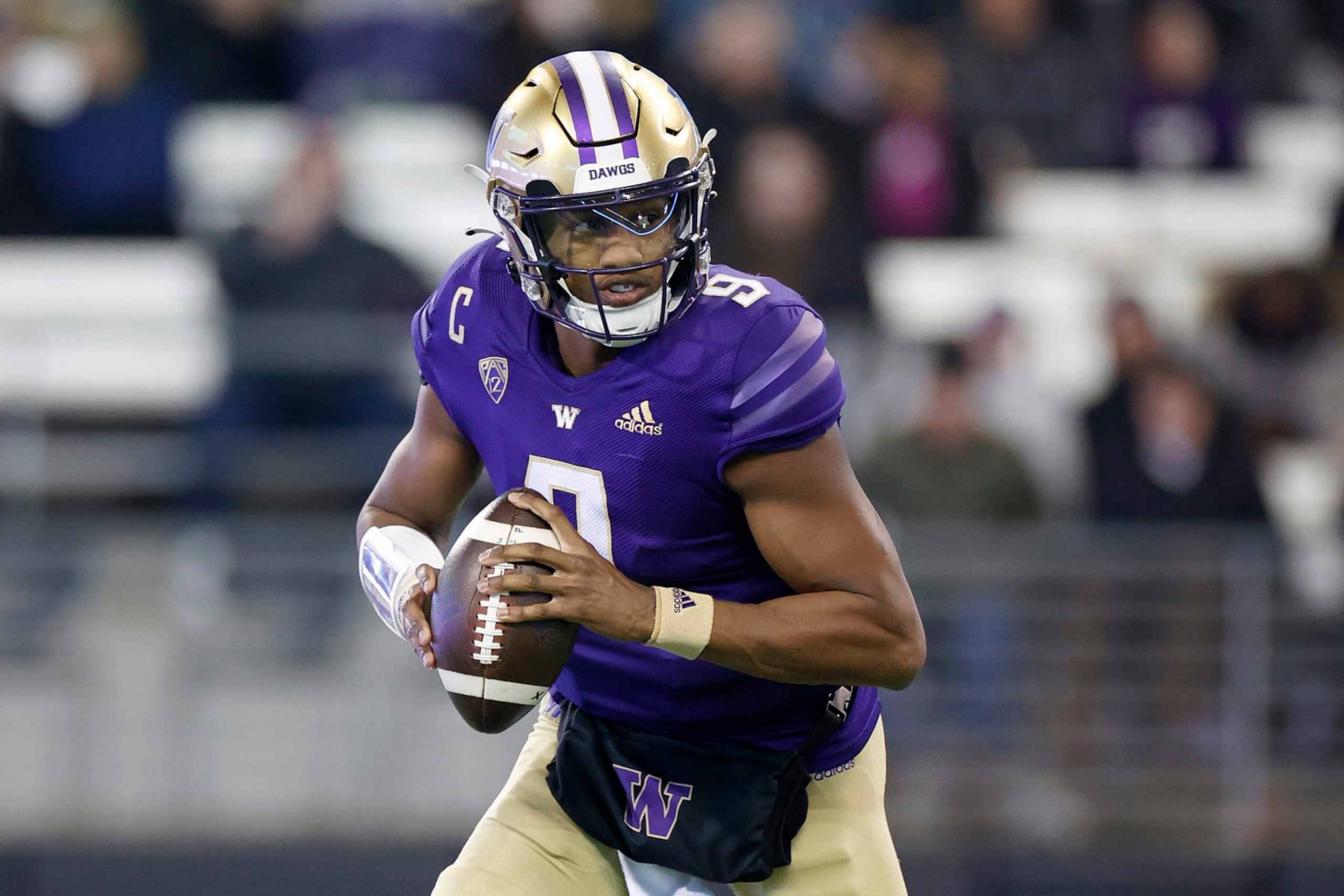 SEATTLE, WASHINGTON - NOVEMBER 19: Michael Penix Jr. #9 of the Washington Huskies passes during the second quarter against the Colorado Buffaloes at Husky Stadium on November 19, 2022 in Seattle, Washington. (Photo by Steph Chambers/Getty Images)