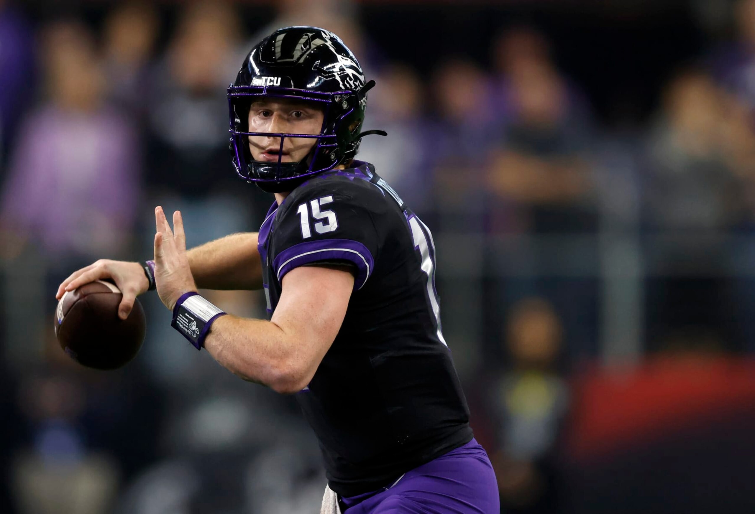 ARLINGTON, TX - DECEMBER 3: Max Duggan #15 of the TCU Horned Frogs looks to throw against the Kansas State Wildcats in the first half of the Big 12 Football Championship at AT&T Stadium on December 3, 2022 in Arlington, Texas.  (Photo by Ron Jenkins/Getty Images)
