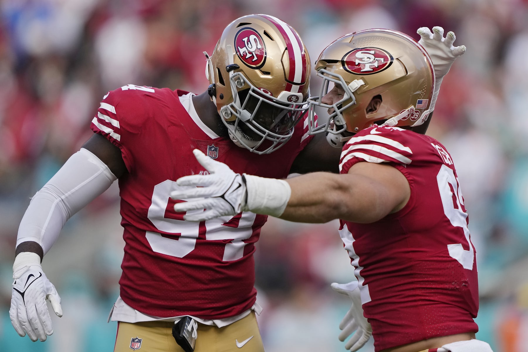 Charles Omenihu and Nick Bosa