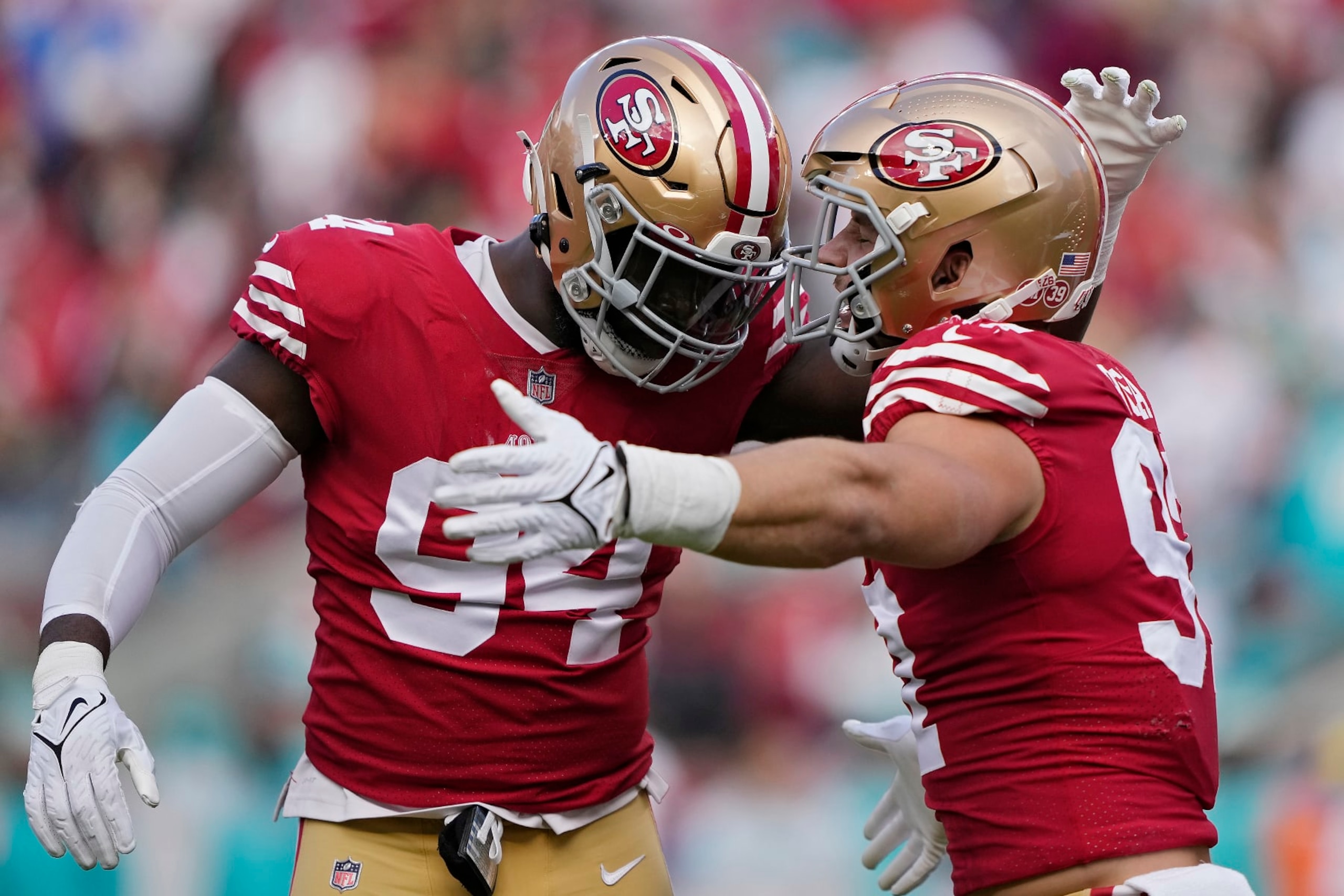 Charles Omenihu and Nick Bosa
