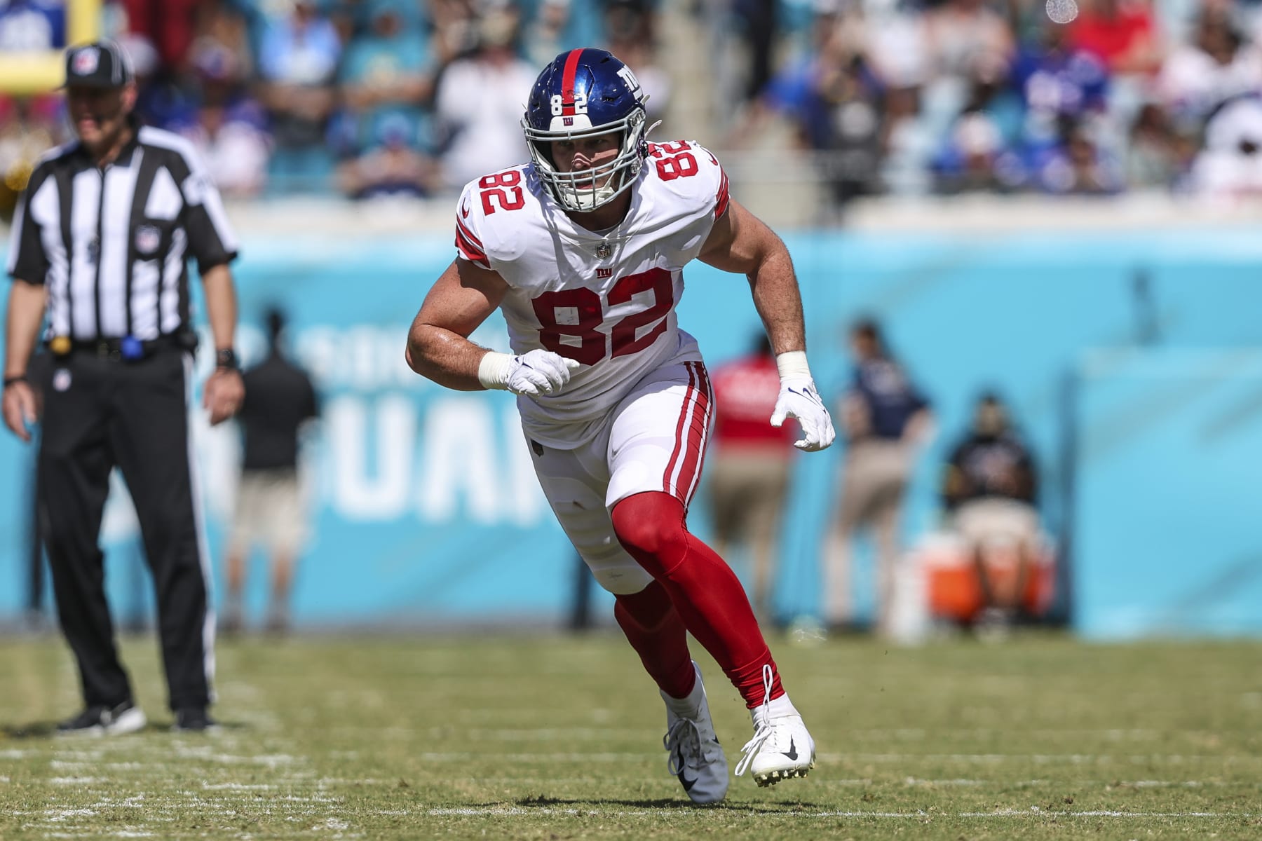 New York Giants tight end Daniel Bellinger (82) runs a route during an NFL football game against the Jacksonville Jaguars on Sunday, Oct. 23, 2022, in Jacksonville, Fla. (AP Photo/Gary McCullough) New York Giants tight end Daniel Bellinger (82) runs a route during an NFL football game against the Jacksonville Jaguars on Sunday, Oct. 23, 2022, in Jacksonville, Fla. (AP Photo/Gary McCullough)