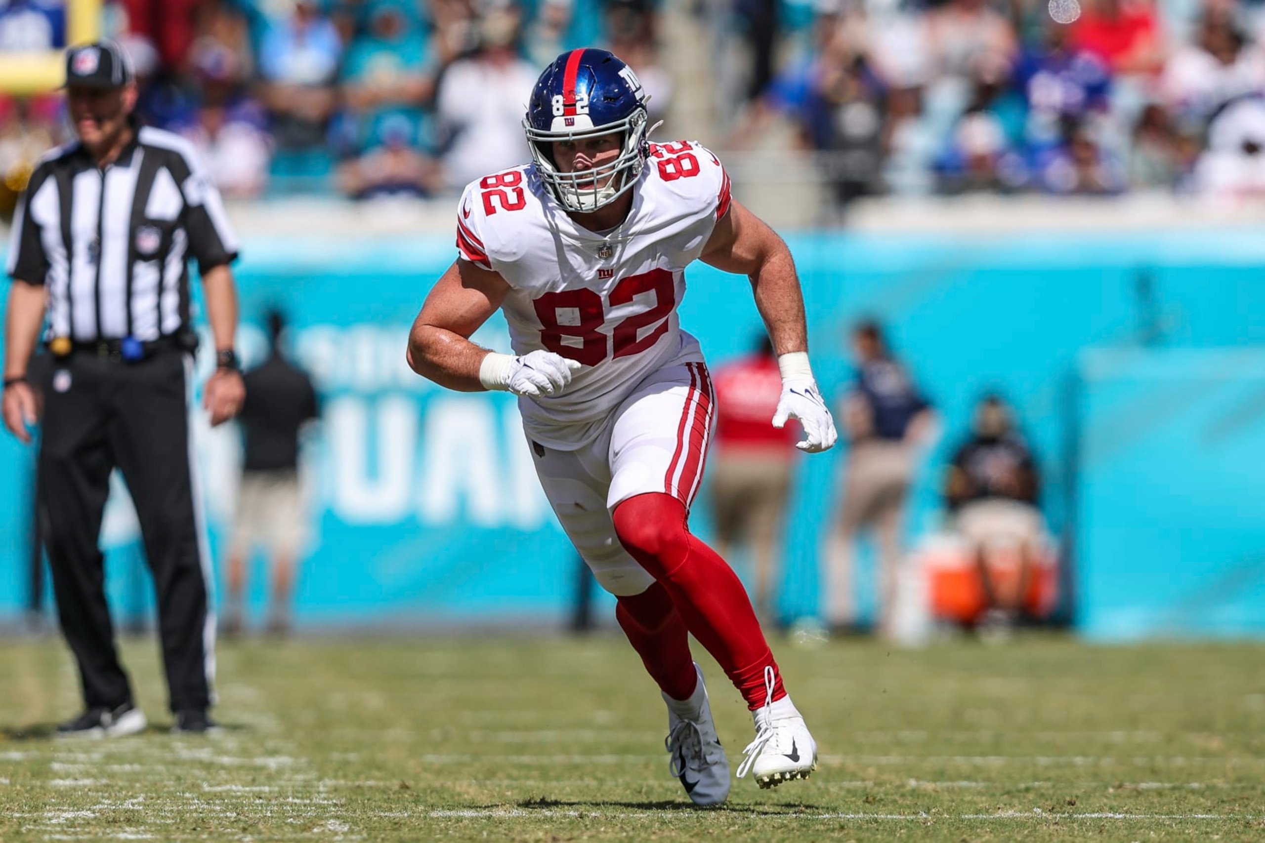 New York Giants tight end Daniel Bellinger (82) runs a route during an NFL football game against the Jacksonville Jaguars on Sunday, Oct. 23, 2022, in Jacksonville, Fla. (AP Photo/Gary McCullough) New York Giants tight end Daniel Bellinger (82) runs a route during an NFL football game against the Jacksonville Jaguars on Sunday, Oct. 23, 2022, in Jacksonville, Fla. (AP Photo/Gary McCullough)