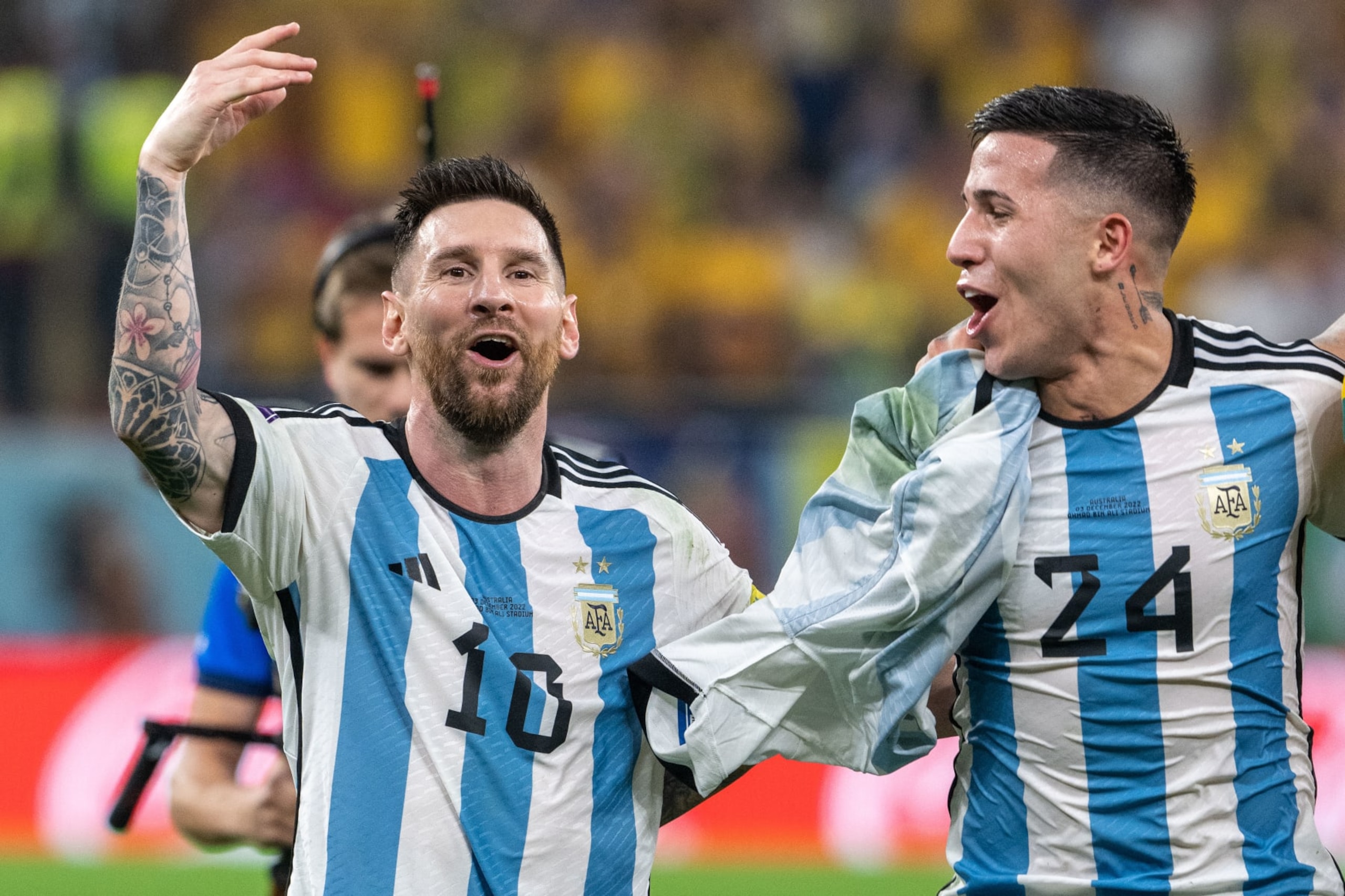 Argentina's Lionel Messi and Enzo Fernández. 