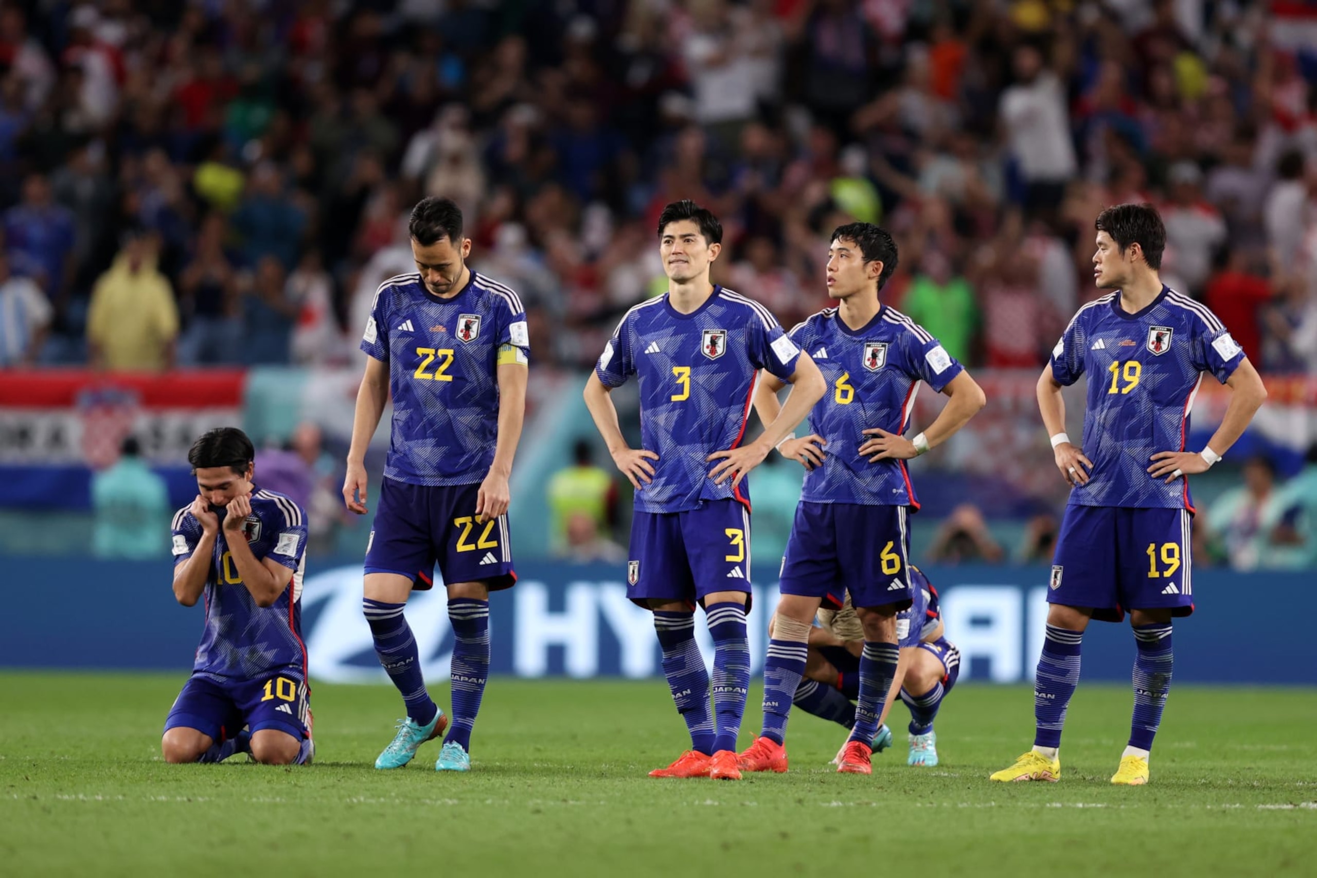 AL WAKRAH, QATAR - DECEMBER 05: Japan players show dejection after their defeat through the penalty shoo during the FIFA World Cup Qatar 2022 Round of 16 match between Japan and Croatia at Al Janoub Stadium on December 05, 2022 in Al Wakrah, Qatar. (Photo by Julian Finney/Getty Images) AL WAKRAH, QATAR - DECEMBER 05: Japan players show dejection after their defeat through the penalty shoo during the FIFA World Cup Qatar 2022 Round of 16 match between Japan and Croatia at Al Janoub Stadium on December 05, 2022 in Al Wakrah, Qatar. (Photo by Julian Finney/Getty Images)
