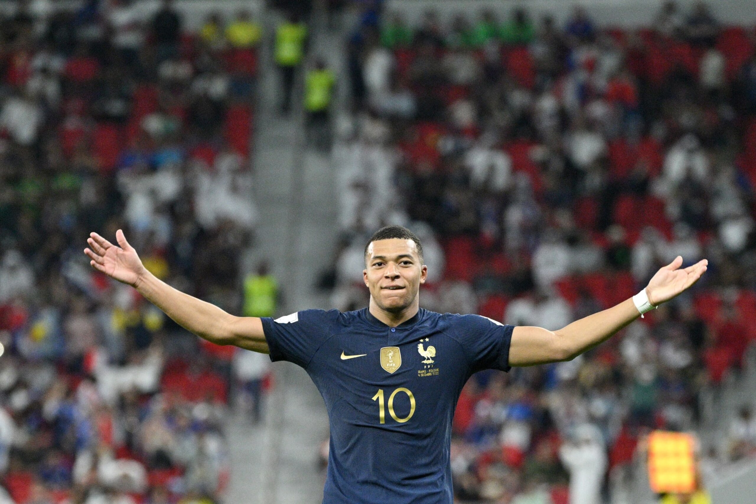 DOHA, QATAR - DECEMBER 04: Kylian Mbappe of France celebrates his second goal during the FIFA World Cup Qatar 2022 Round of 16 match between France and Poland at Al Thumama Stadium on December 04, 2022 in Doha, Qatar. (Photo by Lionel Hahn/Getty Images)