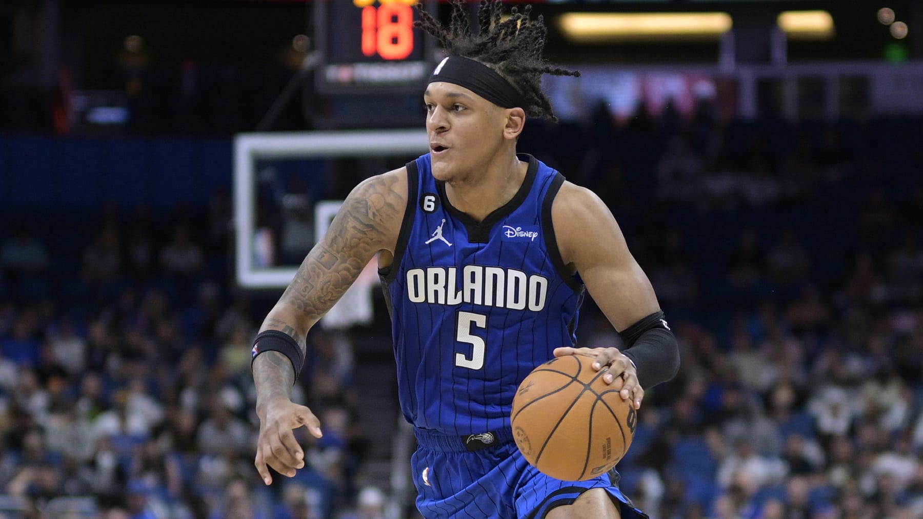 Orlando Magic forward Paolo Banchero (5) drives to the basket against the Atlanta Hawks during the second half of an NBA basketball game, Wednesday, Nov. 30, 2022, in Orlando, Fla. (AP Photo/Phelan M. Ebenhack)