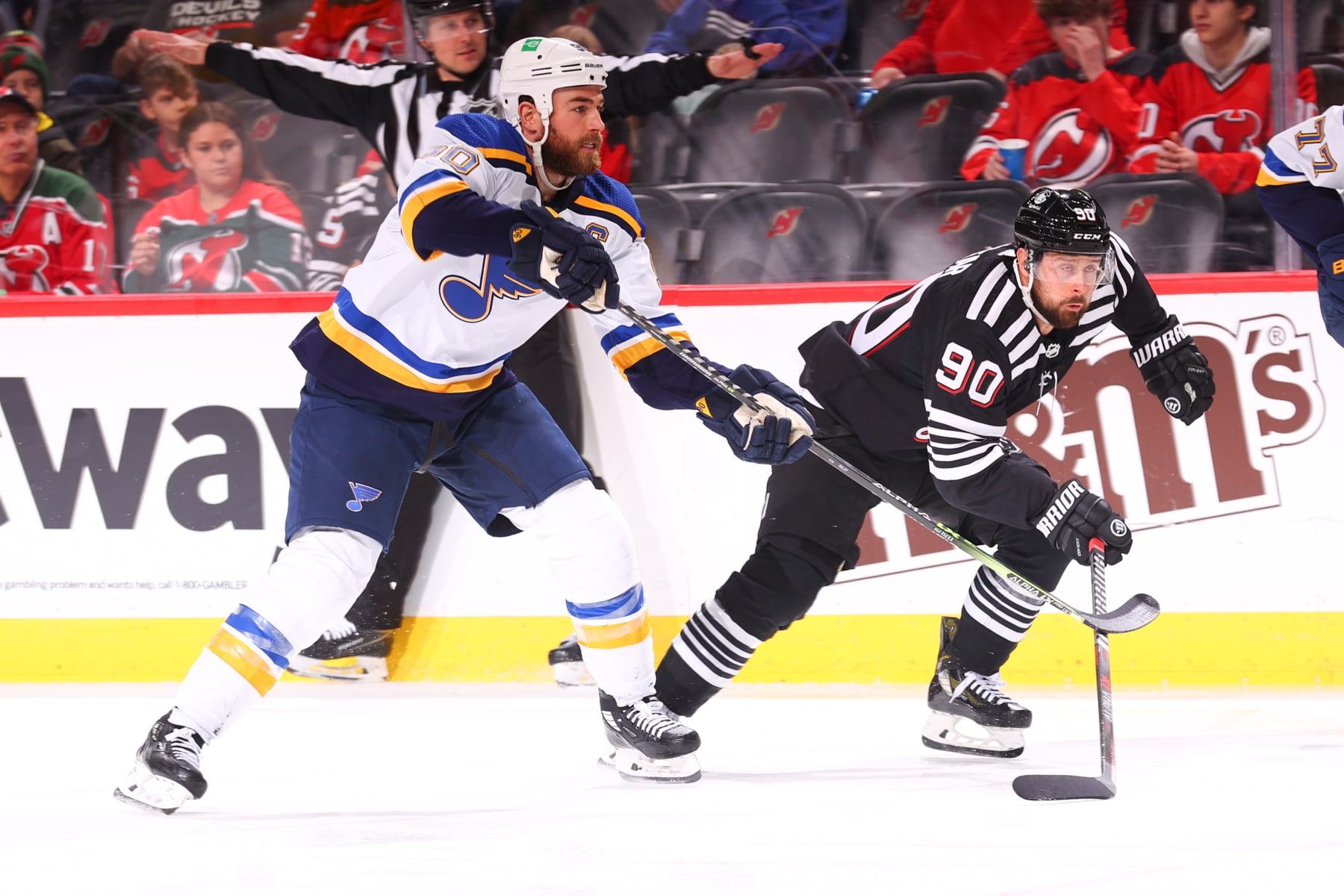 NEWARK, NJ - MARCH 06:  Ryan O'Reilly #90 of the St. Louis Blues skates against Tomas Tatar #90 of the New Jersey Devils on March 6, 2022 at the Prudential Center in Newark, New Jersey.  (Photo by Rich Graessle/Getty Images)