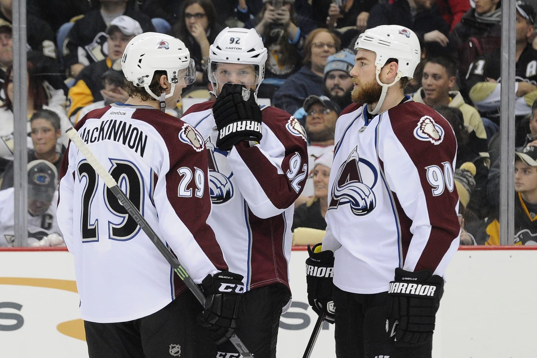 PITTSBURGH, PA - DECEMBER 18:  Nathan MacKinnon #29, Gabriel Landeskog #92 and Ryan O'Reilly #90 of the Colorado Avalanche talk before a faceoff in the second period at Consol Energy Center on December 18, 2014 in Pittsburgh, Pennsylvania.  (Photo by Daniel Kubus/Getty Images)