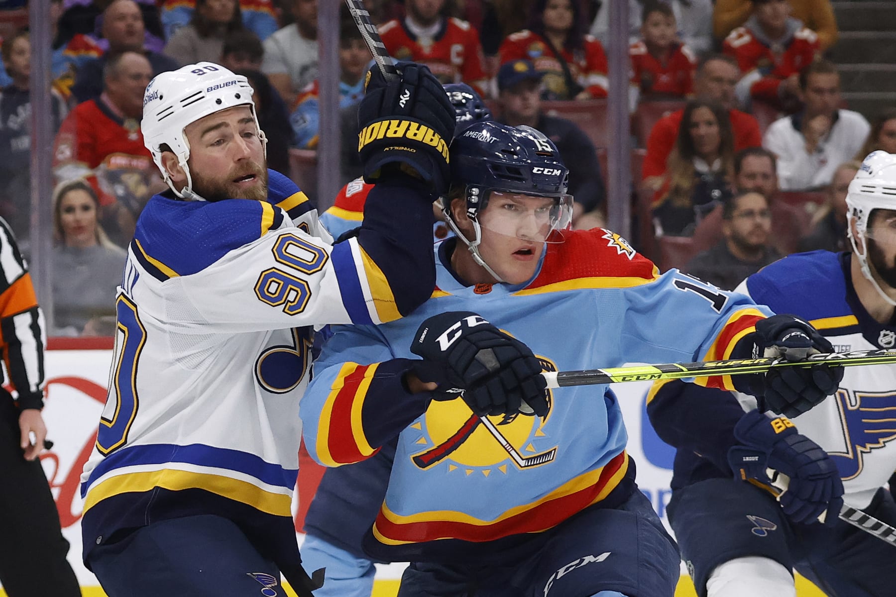 SUNRISE, FL - NOVEMBER 26: Ryan OReilly #90 of the St Louis Blues and Anton Lundell #15 of the Florida Panthers battle for position in front of the net at the FLA Live Arena on November 26, 2022 in Sunrise, Florida. (Photo by Joel Auerbach/Getty Images)