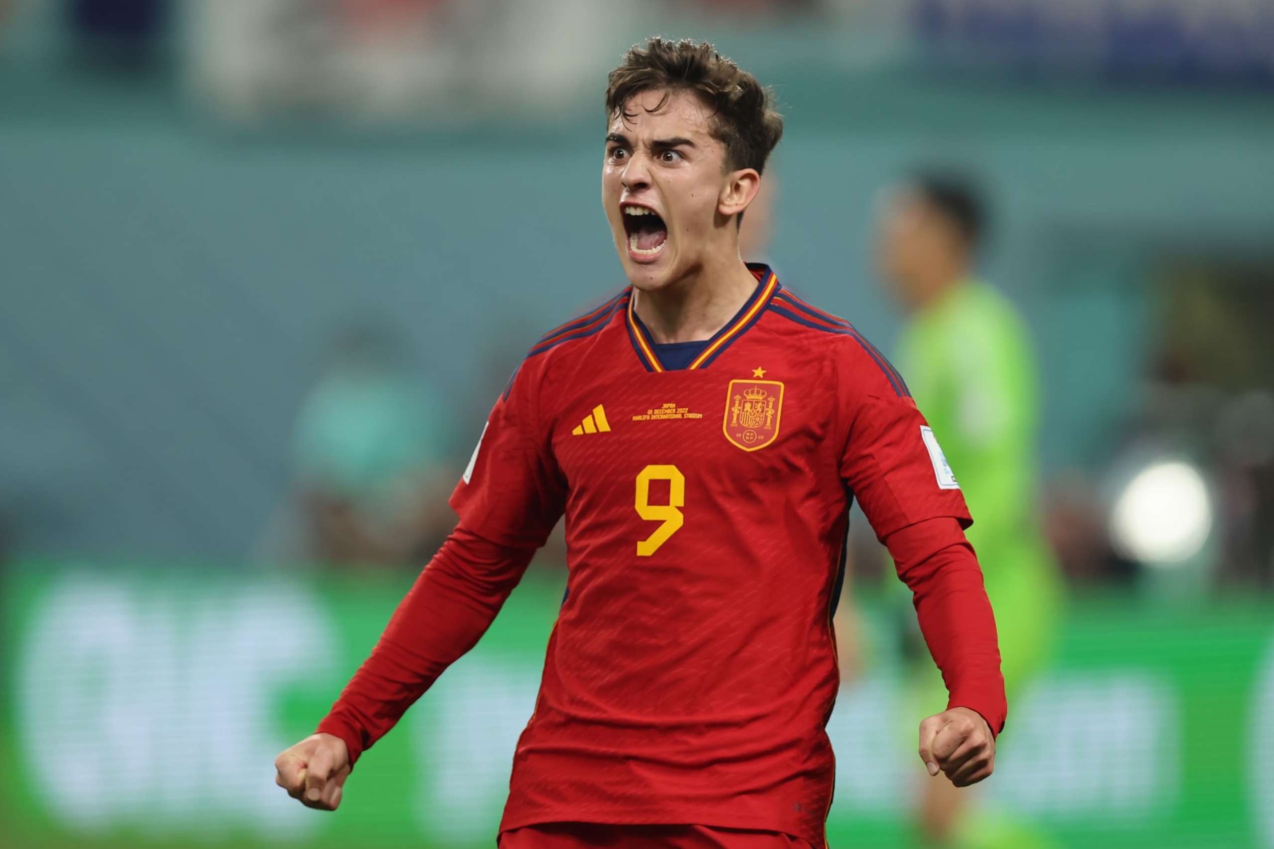 DOHA, QATAR - DECEMBER 01: Gavi of Spain celebrates after team mate Alvaro Morata scored to give the side a 1-0 lead   during the FIFA World Cup Qatar 2022 Group E match between Japan and Spain at Khalifa International Stadium on December 01, 2022 in Doha, Qatar. (Photo by Youssef Loulidi/Fantasista/Getty Images)