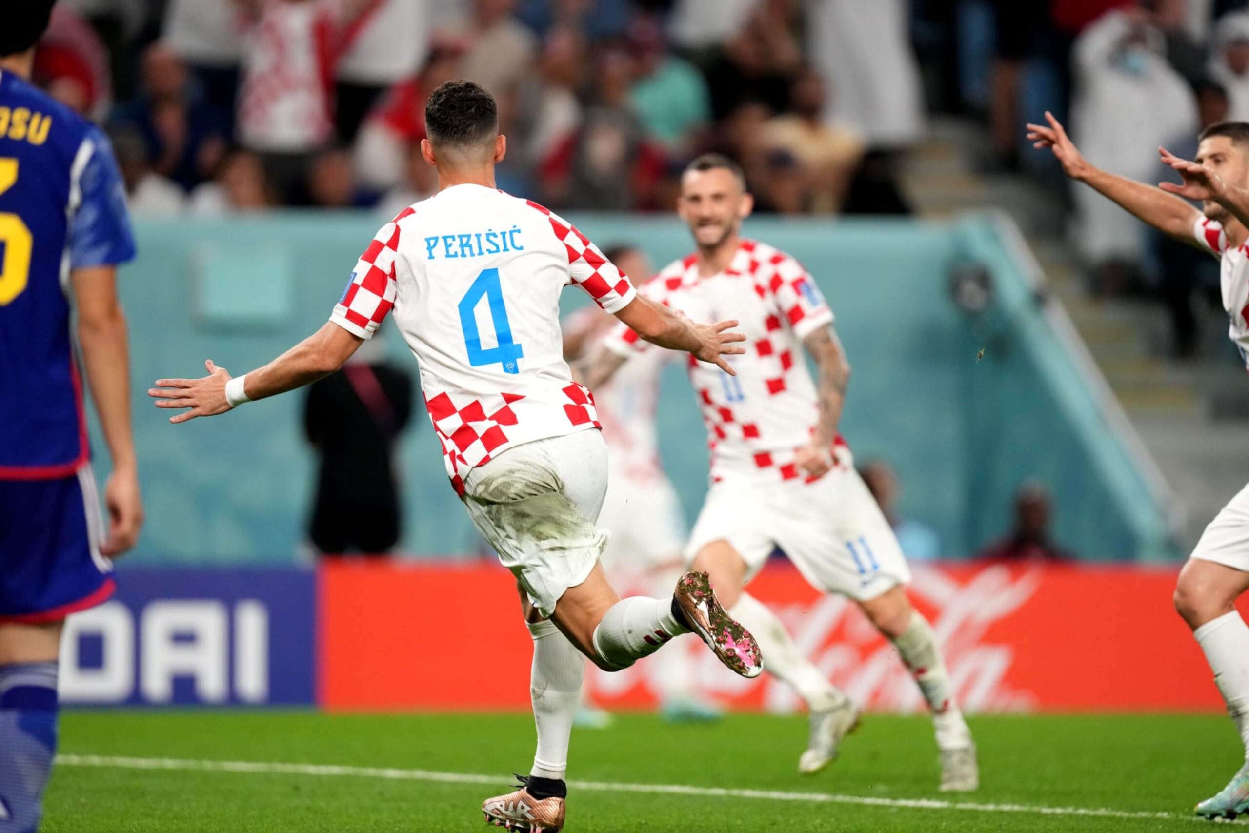 AL WAKRAH, QATAR - DECEMBER 05: Ivan Perisic of Croatia celebrates with team mates after scoring his goal ,during the FIFA World Cup Qatar 2022 Round of 16 match between Japan and Croatia at Al Janoub Stadium on December 5, 2022 in Al Wakrah, Qatar. (Photo by MB Media/Getty Images)