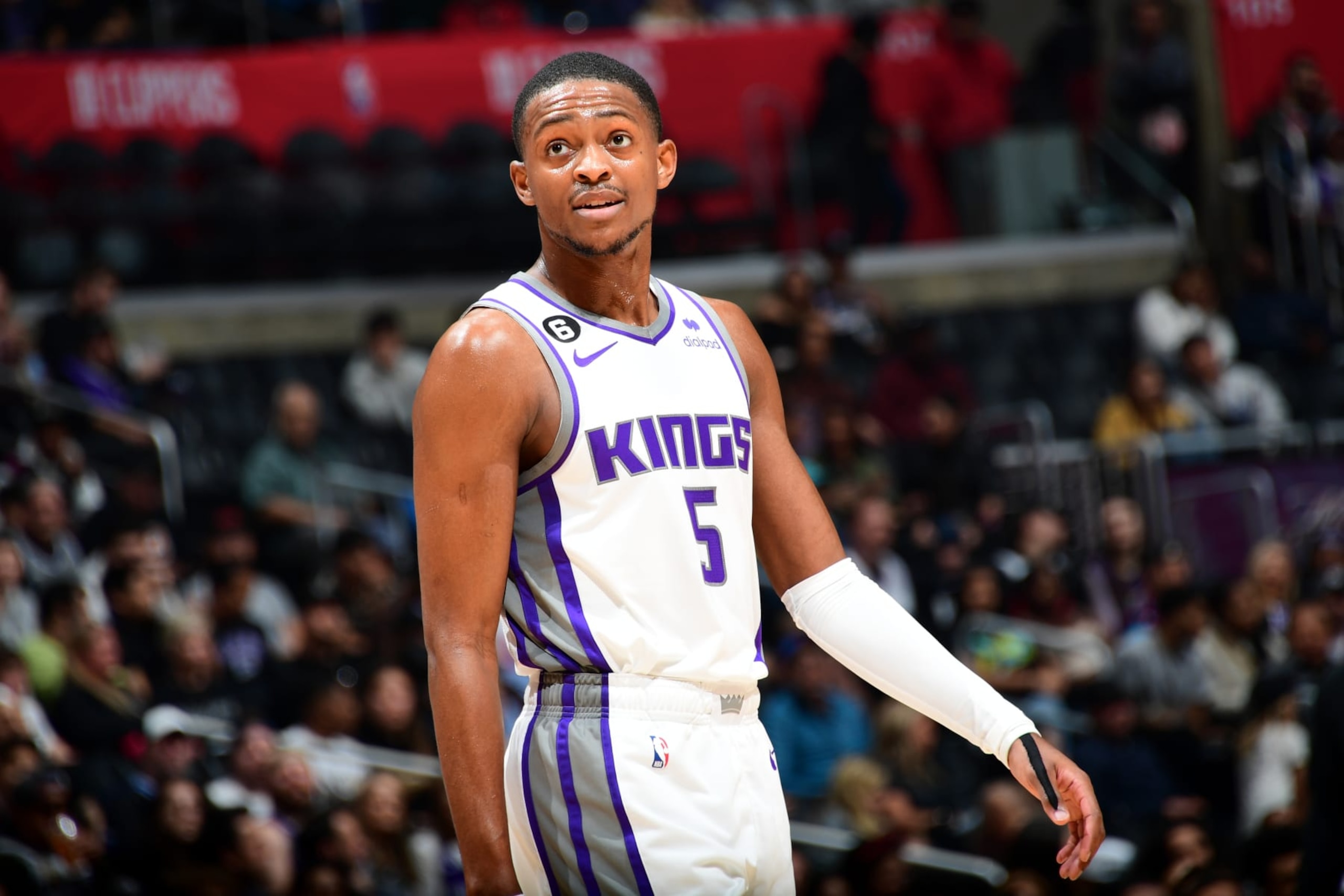 LOS ANGELES, CA - DECEMBER 3: De'Aaron Fox #5 of the Sacramento Kings looks on during the game against the LA Clippers on December 3, 2022 at Crypto.Com Arena in Los Angeles, California. NOTE TO USER: User expressly acknowledges and agrees that, by downloading and/or using this Photograph, user is consenting to the terms and conditions of the Getty Images License Agreement. Mandatory Copyright Notice: Copyright 2022 NBAE (Photo by Adam Pantozzi/NBAE via Getty Images) LOS ANGELES, CA - DECEMBER 3: De'Aaron Fox #5 of the Sacramento Kings looks on during the game against the LA Clippers on December 3, 2022 at Crypto.Com Arena in Los Angeles, California. NOTE TO USER: User expressly acknowledges and agrees that, by downloading and/or using this Photograph, user is consenting to the terms and conditions of the Getty Images License Agreement. Mandatory Copyright Notice: Copyright 2022 NBAE (Photo by Adam Pantozzi/NBAE via Getty Images)
