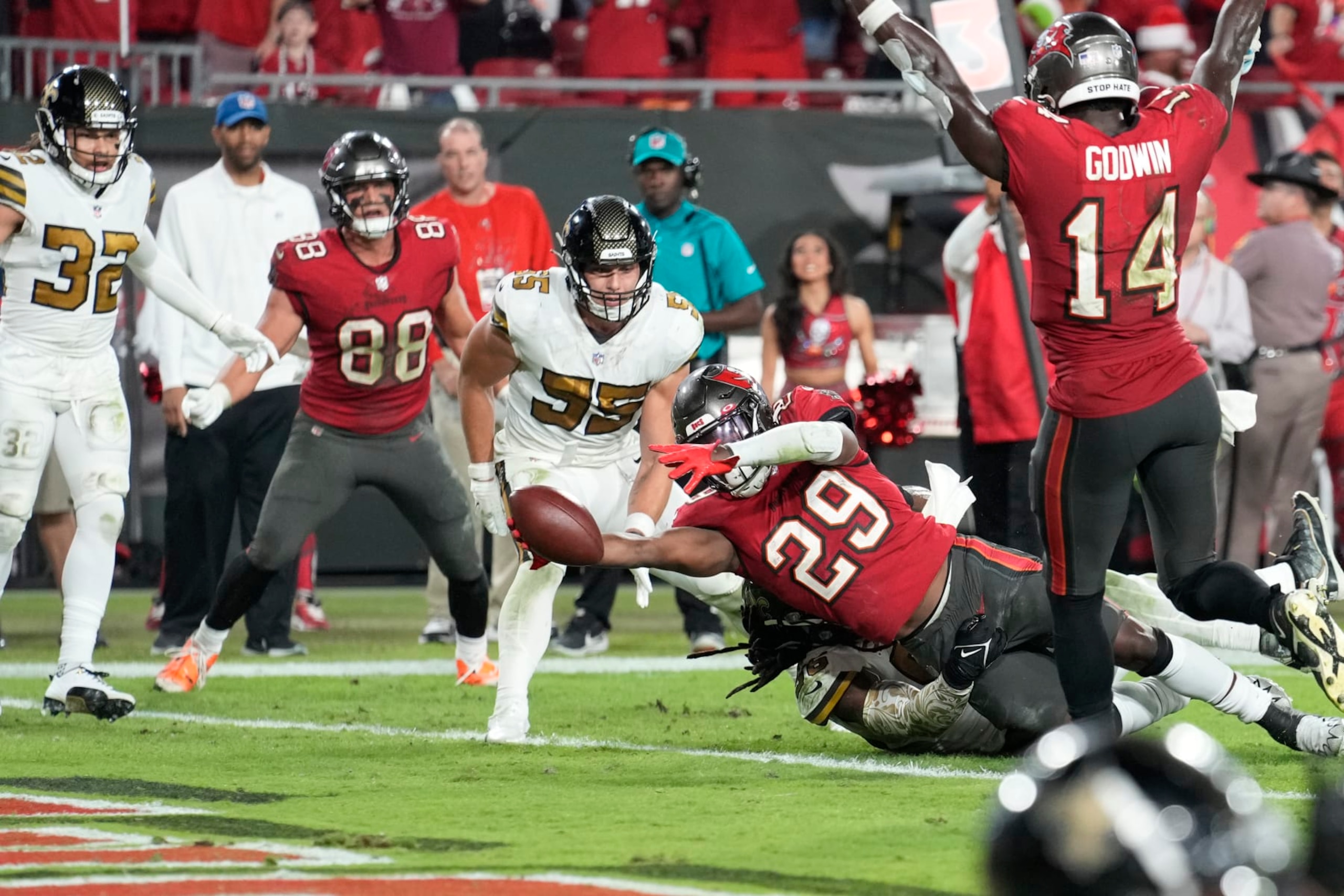 Rookie running back Rachaad White scores the winning touchdown. 