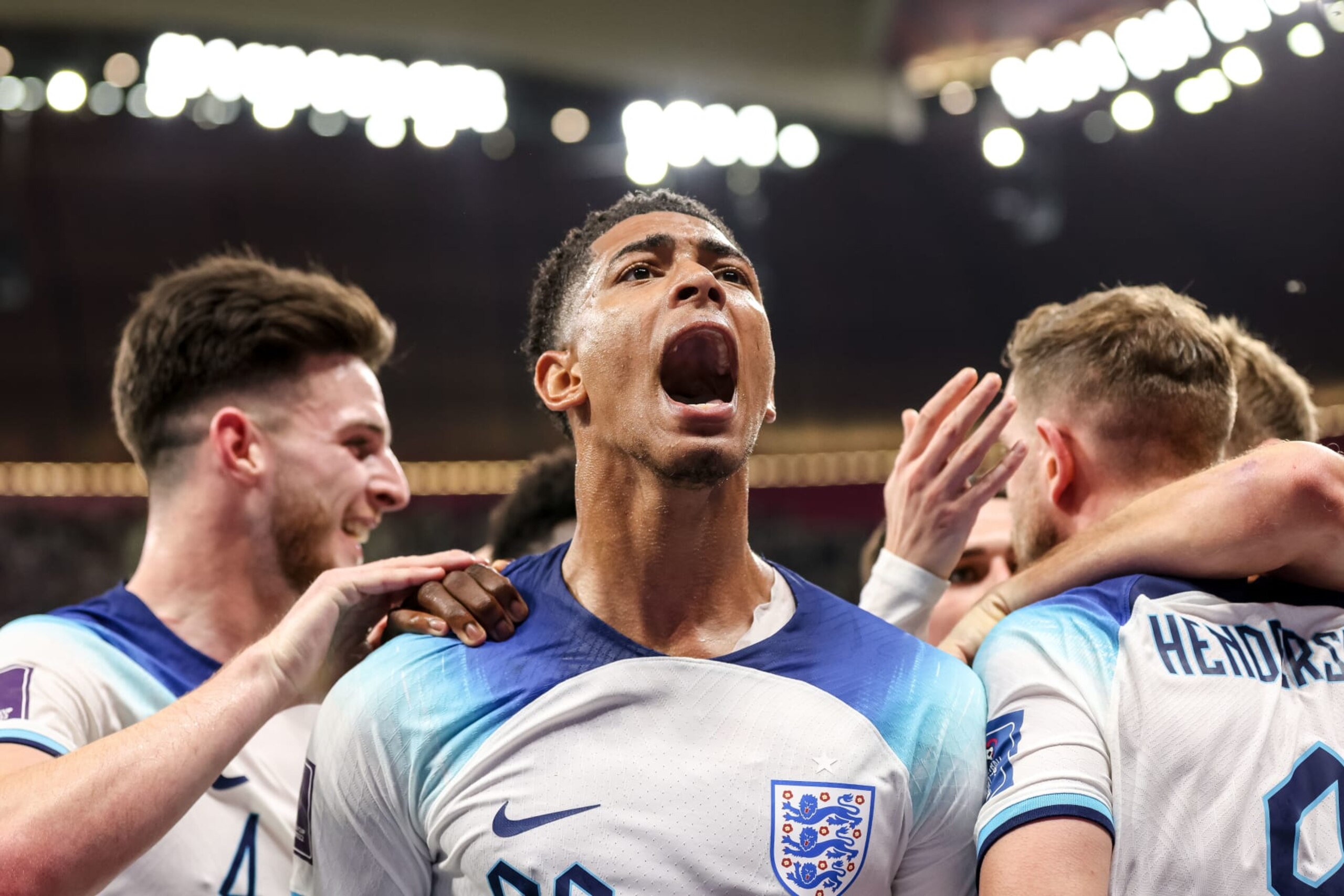 AL KHOR, QATAR - DECEMBER 04: Jude Bellingham of England Goal celebrations, cheers after Jordan Henderson of England scores the 1-0 goal. prior to the FIFA World Cup Qatar 2022 Round of 16 match between England and Senegal at Al Bayt Stadium on December 4, 2022 in Al Khor, Qatar. (Photo by Tnani Badreddine/DeFodi Images via Getty Images) AL KHOR, QATAR - DECEMBER 04: Jude Bellingham of England Goal celebrations, cheers after Jordan Henderson of England scores the 1-0 goal. prior to the FIFA World Cup Qatar 2022 Round of 16 match between England and Senegal at Al Bayt Stadium on December 4, 2022 in Al Khor, Qatar. (Photo by Tnani Badreddine/DeFodi Images via Getty Images)