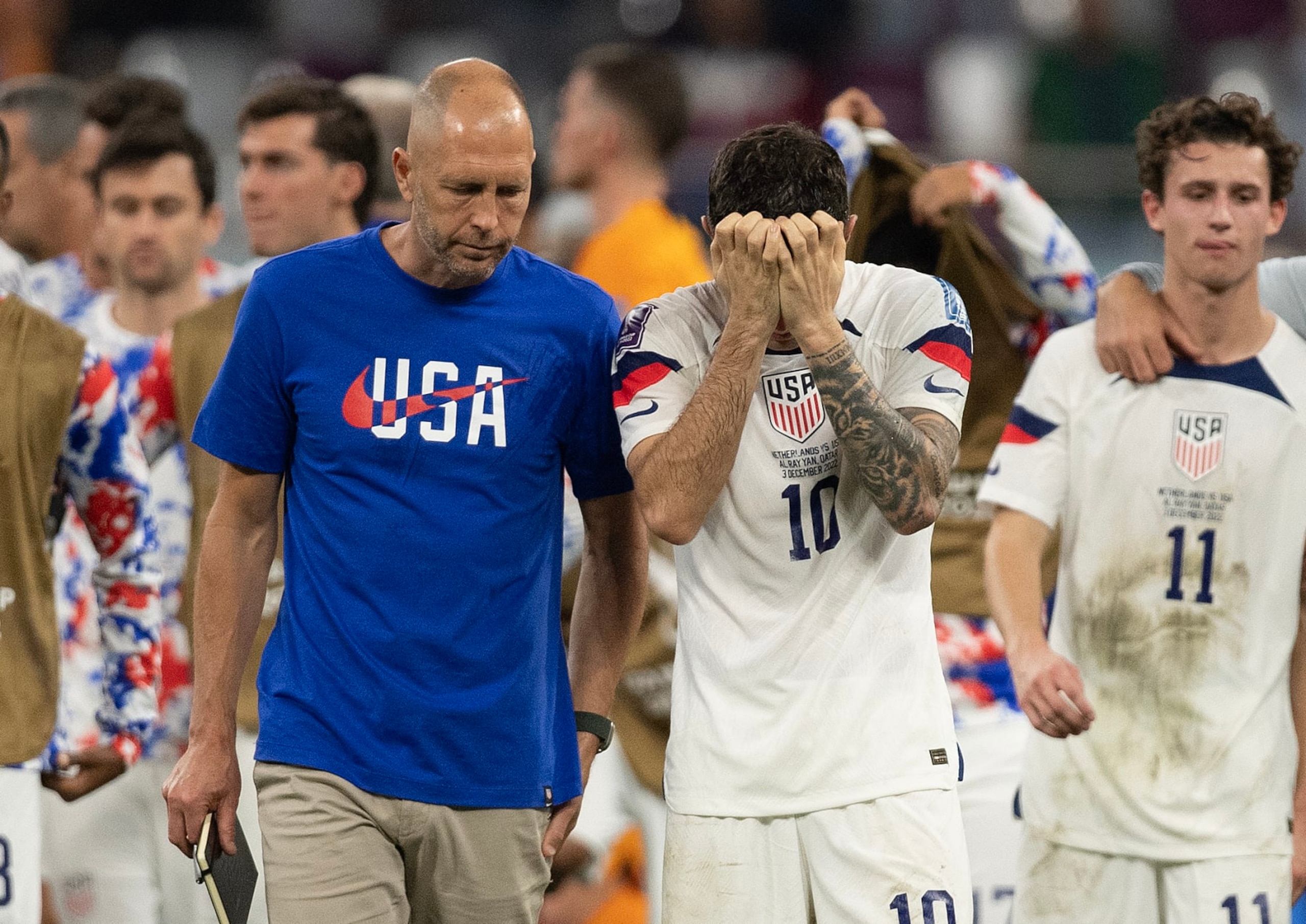 DOHA, QATAR - DECEMBER 03: Christian Pulisic of USA is consoled by Head Coach Gregg Berhalter after defeat in the FIFA World Cup Qatar 2022 Round of 16 match between Netherlands and USA at Khalifa International Stadium on December 03, 2022 in Doha, Qatar. (Photo by Visionhaus/Getty Images) DOHA, QATAR - DECEMBER 03: Christian Pulisic of USA is consoled by Head Coach Gregg Berhalter after defeat in the FIFA World Cup Qatar 2022 Round of 16 match between Netherlands and USA at Khalifa International Stadium on December 03, 2022 in Doha, Qatar. (Photo by Visionhaus/Getty Images)