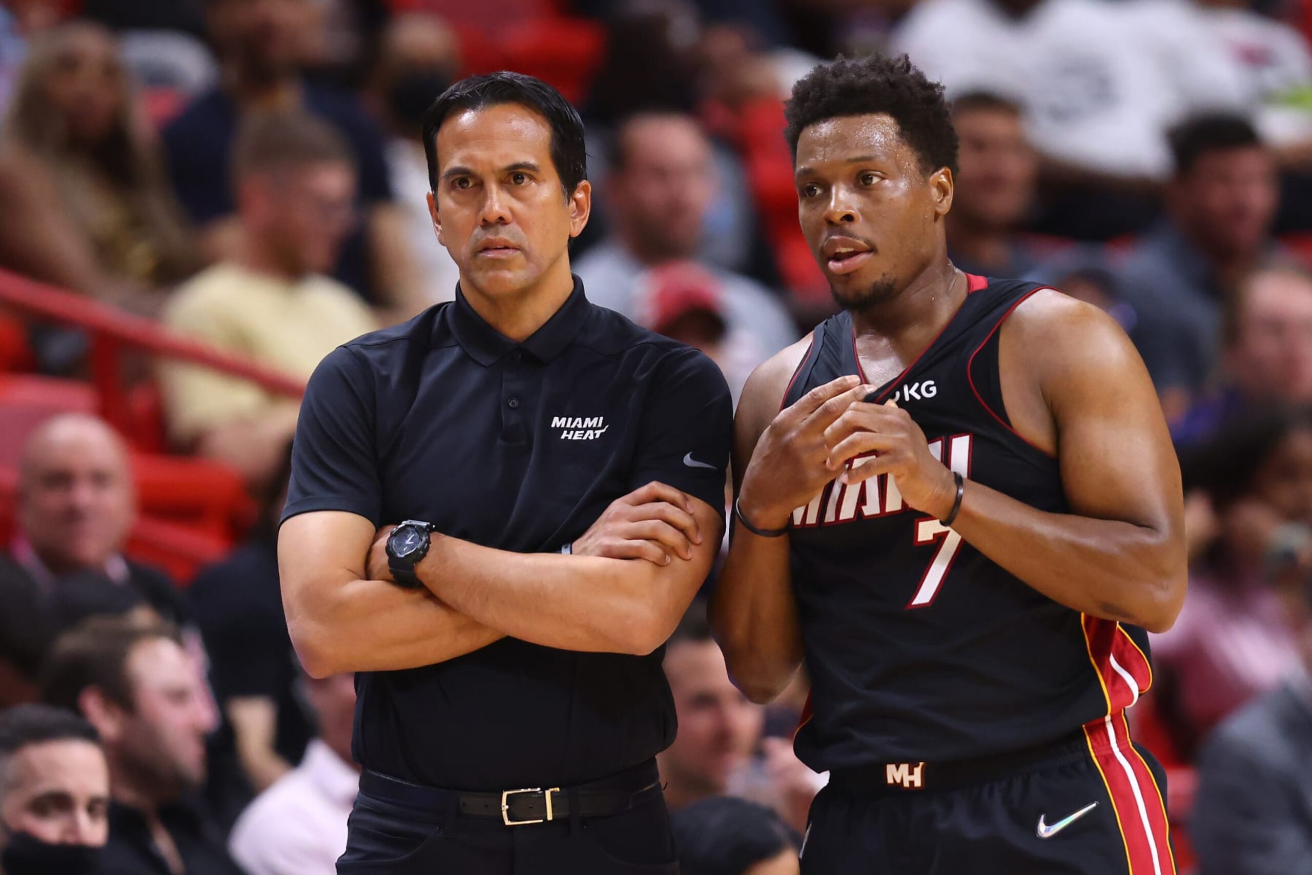 MIAMI, FLORIDA - MARCH 18: Head coach Erik Spoelstra and Kyle Lowry #7 of the Miami Heat talk against the Oklahoma City Thunder during the first half at FTX Arena on March 18, 2022 in Miami, Florida. NOTE TO USER: User expressly acknowledges and agrees that, by downloading and or using this photograph, User is consenting to the terms and conditions of the Getty Images License Agreement. (Photo by Michael Reaves/Getty Images)