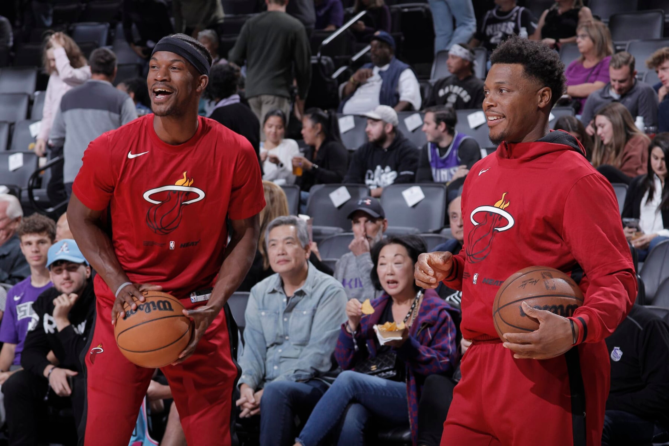 SACRAMENTO, CA - OCTOBER 29: Jimmy Butler #22 and Kyle Lowry #7 of the Miami Heat warm up prior to the game against the Sacramento Kings on October 29, 2022 at Golden 1 Center in Sacramento, California. NOTE TO USER: User expressly acknowledges and agrees that, by downloading and or using this photograph, User is consenting to the terms and conditions of the Getty Images Agreement. Mandatory Copyright Notice: Copyright 2022 NBAE (Photo by Rocky Widner/NBAE via Getty Images)