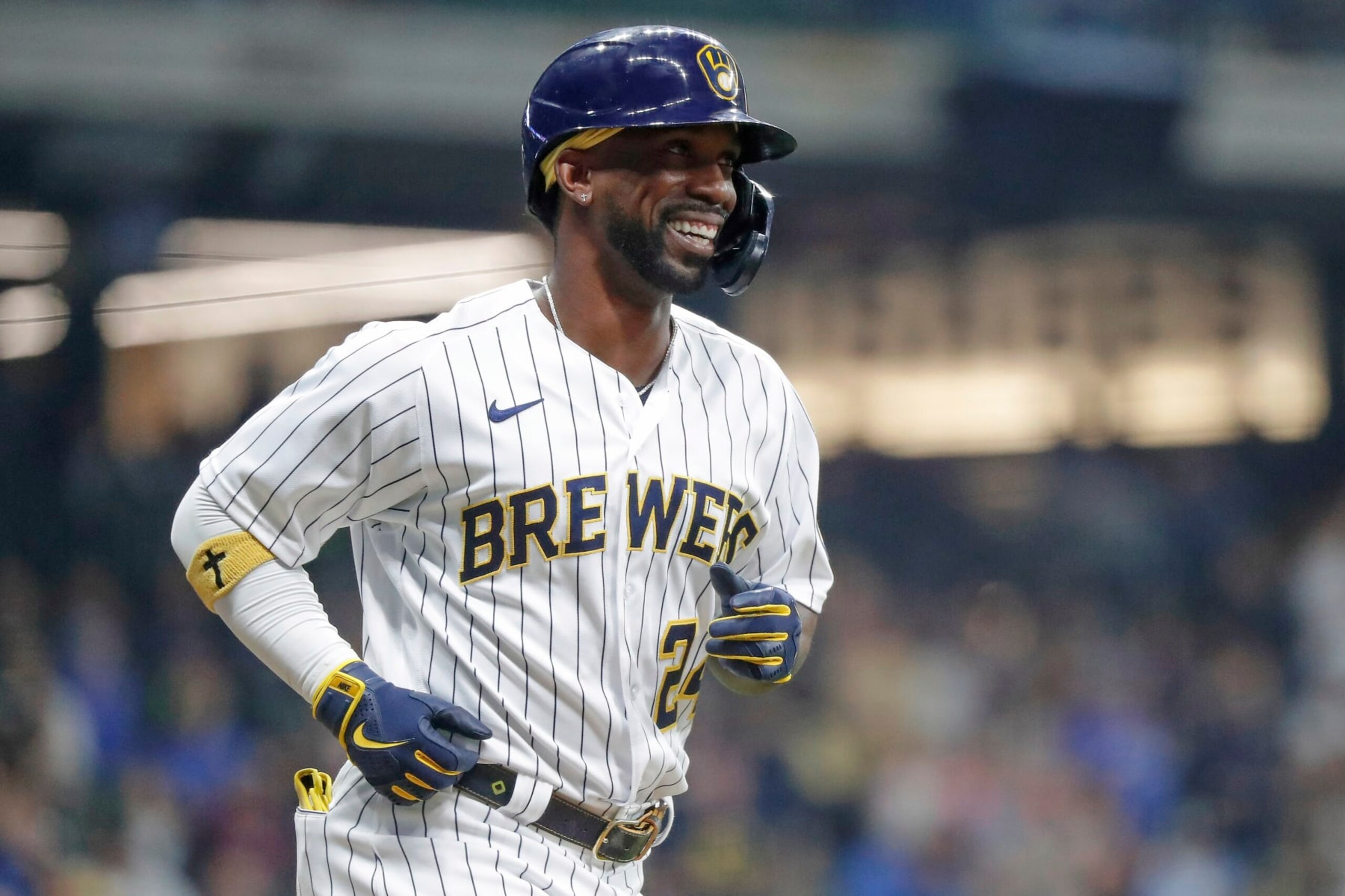 Milwaukee Brewers designated hitter Andrew McCutchen reacts after walking against the Miami Marlins during the sixth inning of a baseball game Saturday, Oct. 1, 2022, in Milwaukee. (AP Photo/Jon Durr)
