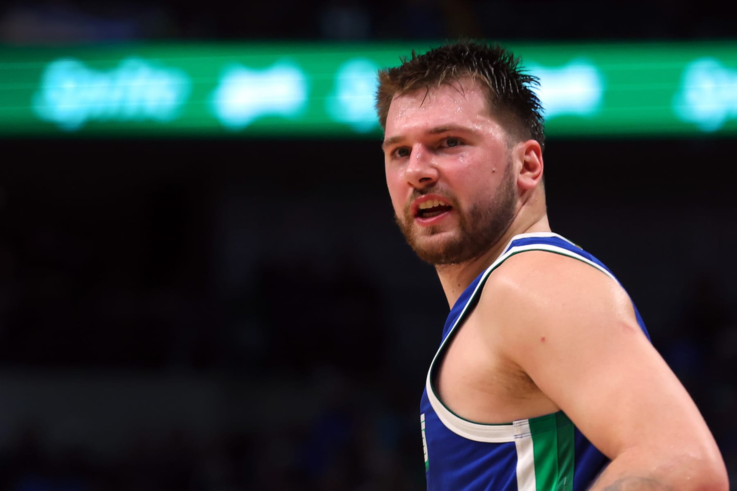 DALLAS, TEXAS - DECEMBER 05: Luka Doncic #77 of the Dallas Mavericks reacts on the court during a game against the Phoenix Suns at American Airlines Center on December 05, 2022 in Dallas, Texas. NOTE TO USER: User expressly acknowledges and agrees that, by downloading and/or using this Photograph, user is consenting to the terms and conditions of the Getty Images License Agreement.  (Photo by Richard Rodriguez/Getty Images)