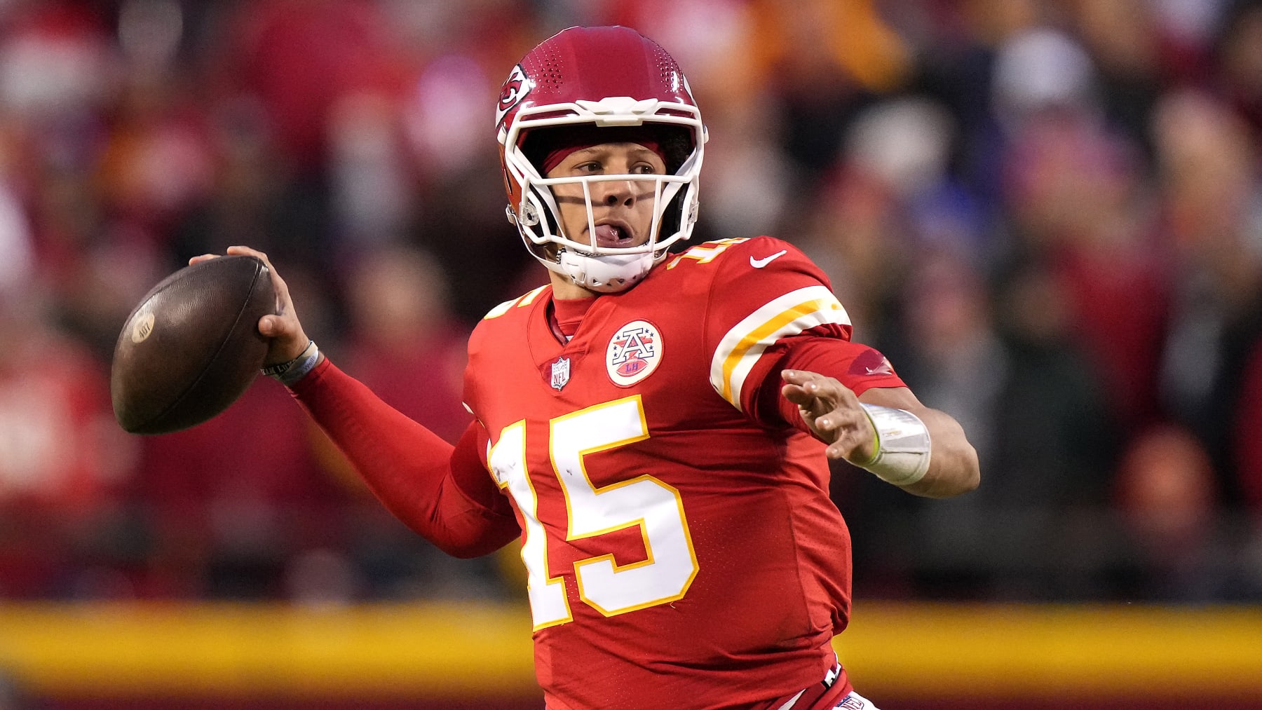 Kansas City Chiefs quarterback Patrick Mahomes looks to throw during the first half of an NFL football game against the Los Angeles Rams Sunday, Nov. 27, 2022, in Kansas City, Mo. (AP Photo/Charlie Riedel)