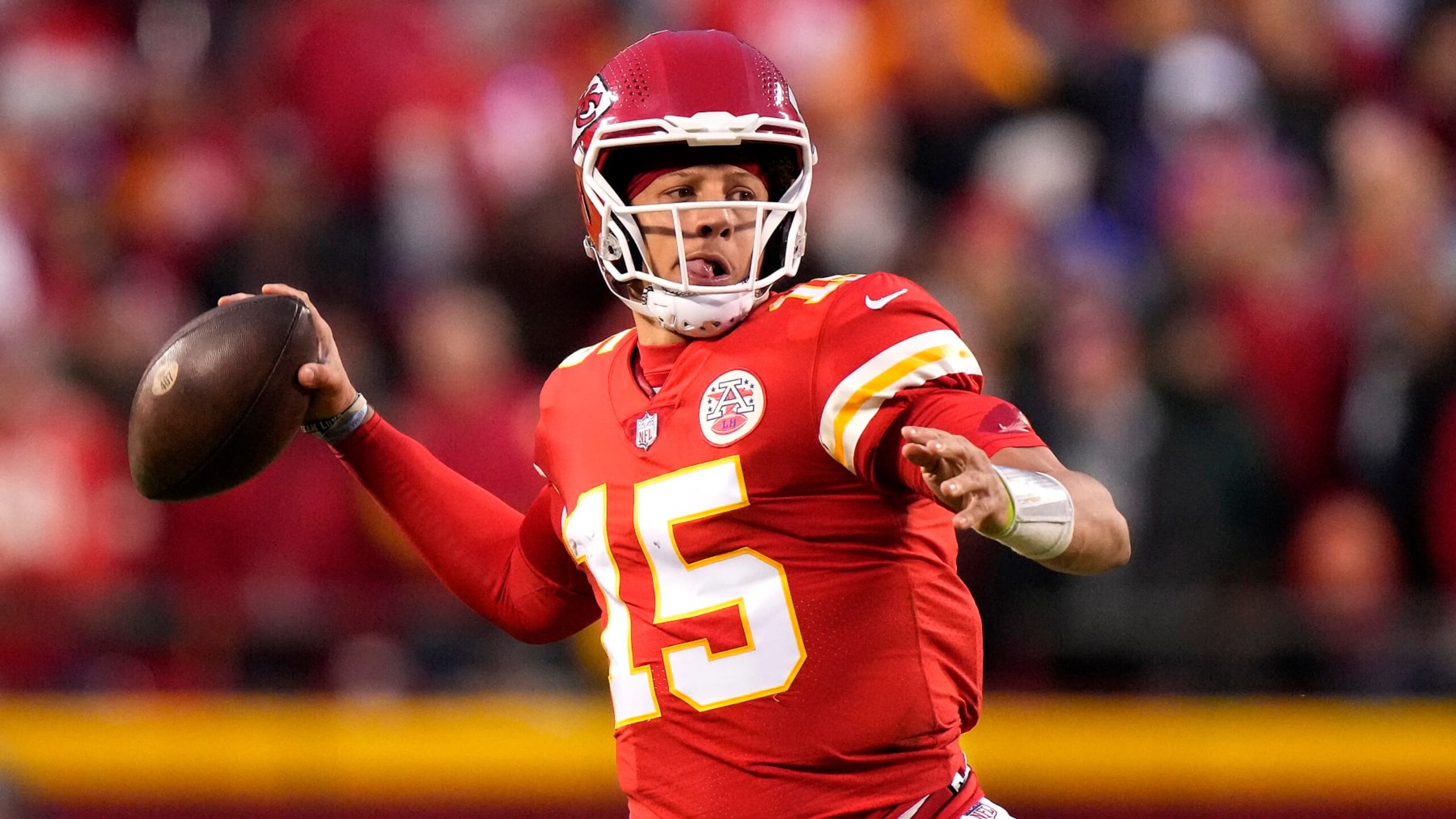 Kansas City Chiefs quarterback Patrick Mahomes looks to throw during the first half of an NFL football game against the Los Angeles Rams Sunday, Nov. 27, 2022, in Kansas City, Mo. (AP Photo/Charlie Riedel)