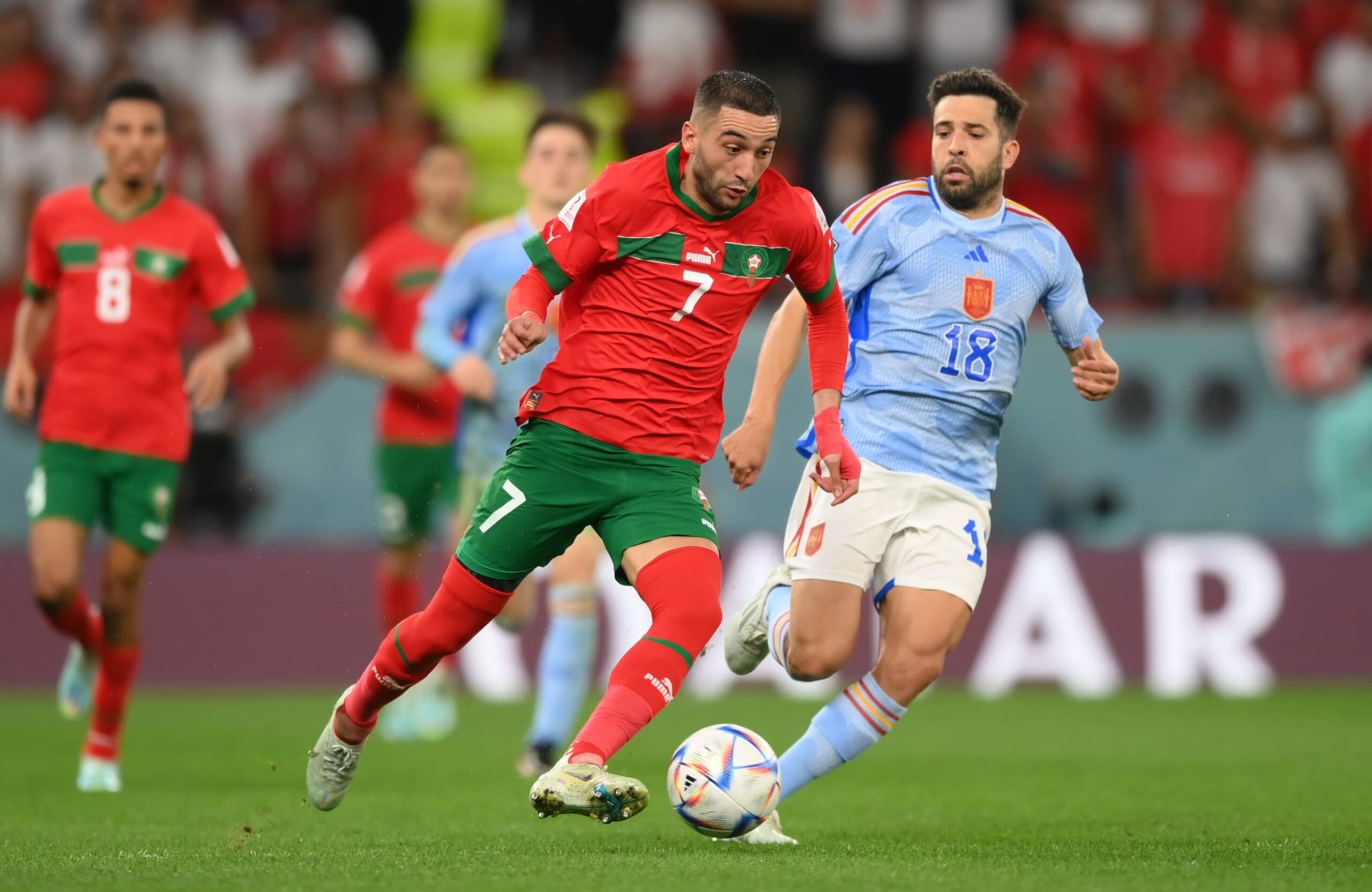 AL RAYYAN, QATAR - DECEMBER 06: Hakim Ziyech of Morocco battles for possession with Jordi Alba of Spain during the FIFA World Cup Qatar 2022 Round of 16 match between Morocco and Spain at Education City Stadium on December 06, 2022 in Al Rayyan, Qatar. (Photo by Shaun Botterill - FIFA/FIFA via Getty Images)