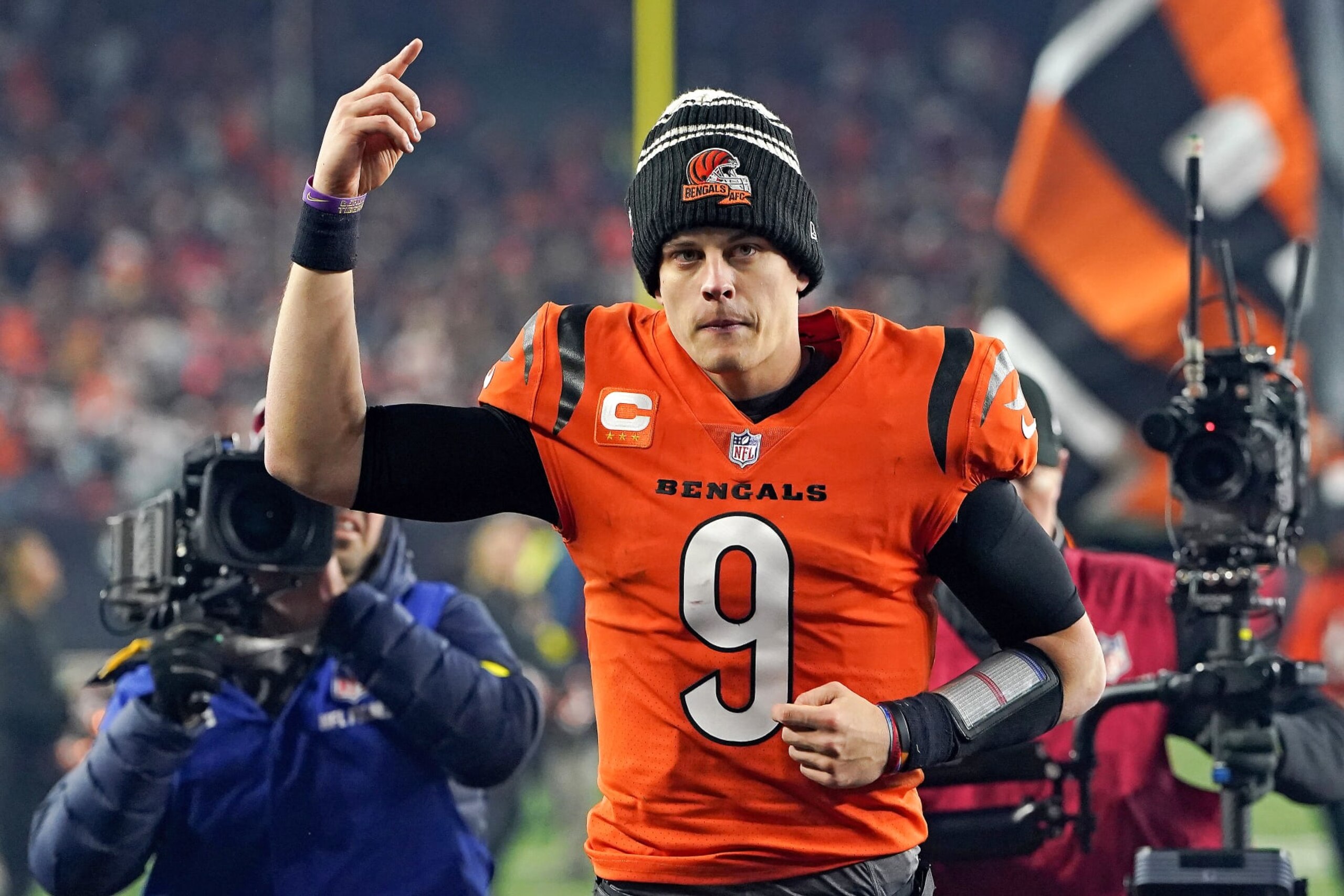 CINCINNATI, OHIO - DECEMBER 04: Joe Burrow #9 of the Cincinnati Bengals runs off the field after the Kansas City Chiefs at Paycor Stadium on December 04, 2022 in Cincinnati, Ohio. (Photo by Dylan Buell/Getty Images)