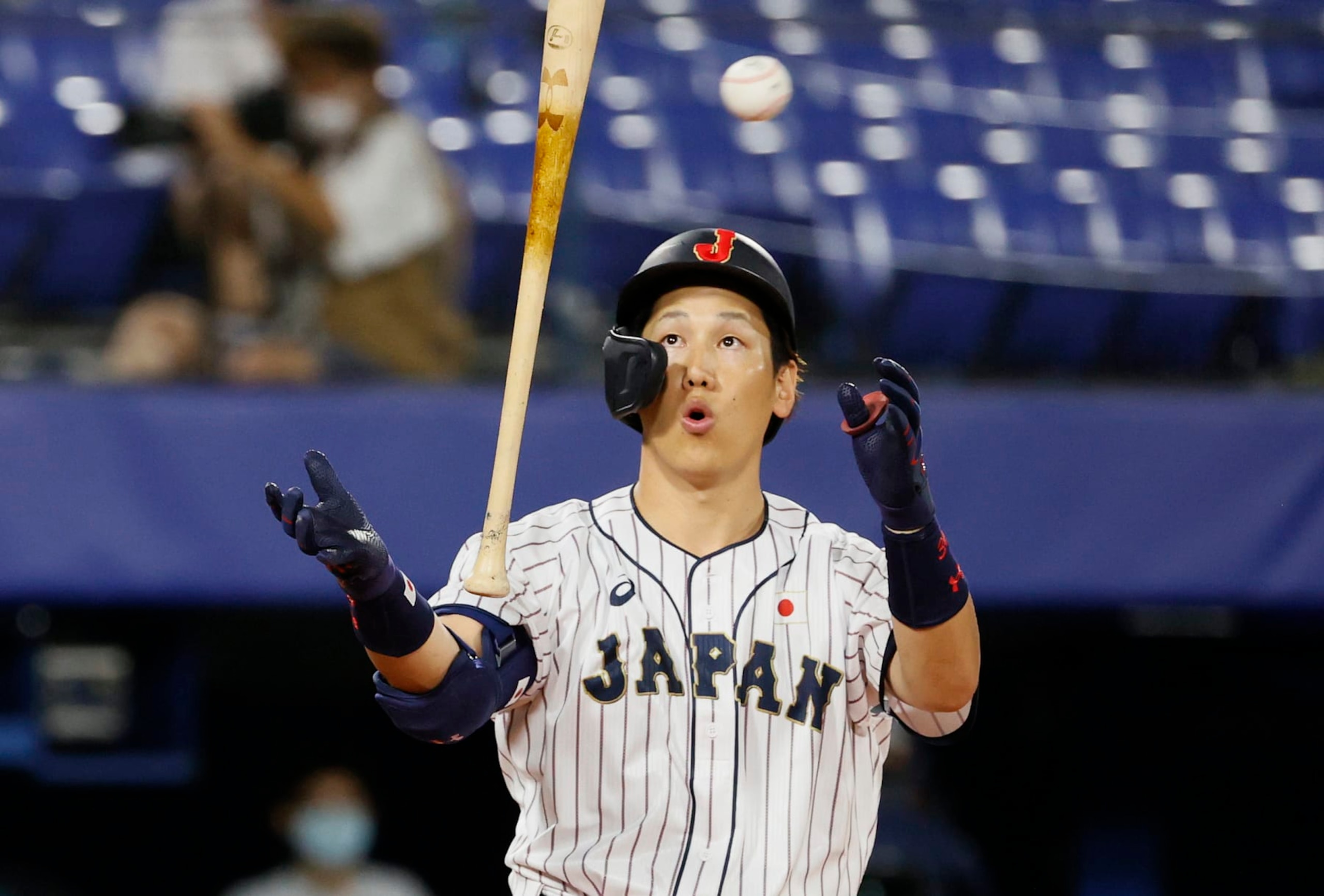YOKOHAMA, JAPAN - AUGUST 07: Outfielder Masataka Yoshida #34 of Team Japan reacts while at bat in the sixth inning against Team United States during the gold medal game between Team United States and Team Japan on day fifteen of the Tokyo 2020 Olympic Games at Yokohama Baseball Stadium on August 07, 2021 in Yokohama, Kanagawa, Japan. (Photo by Steph Chambers/Getty Images)