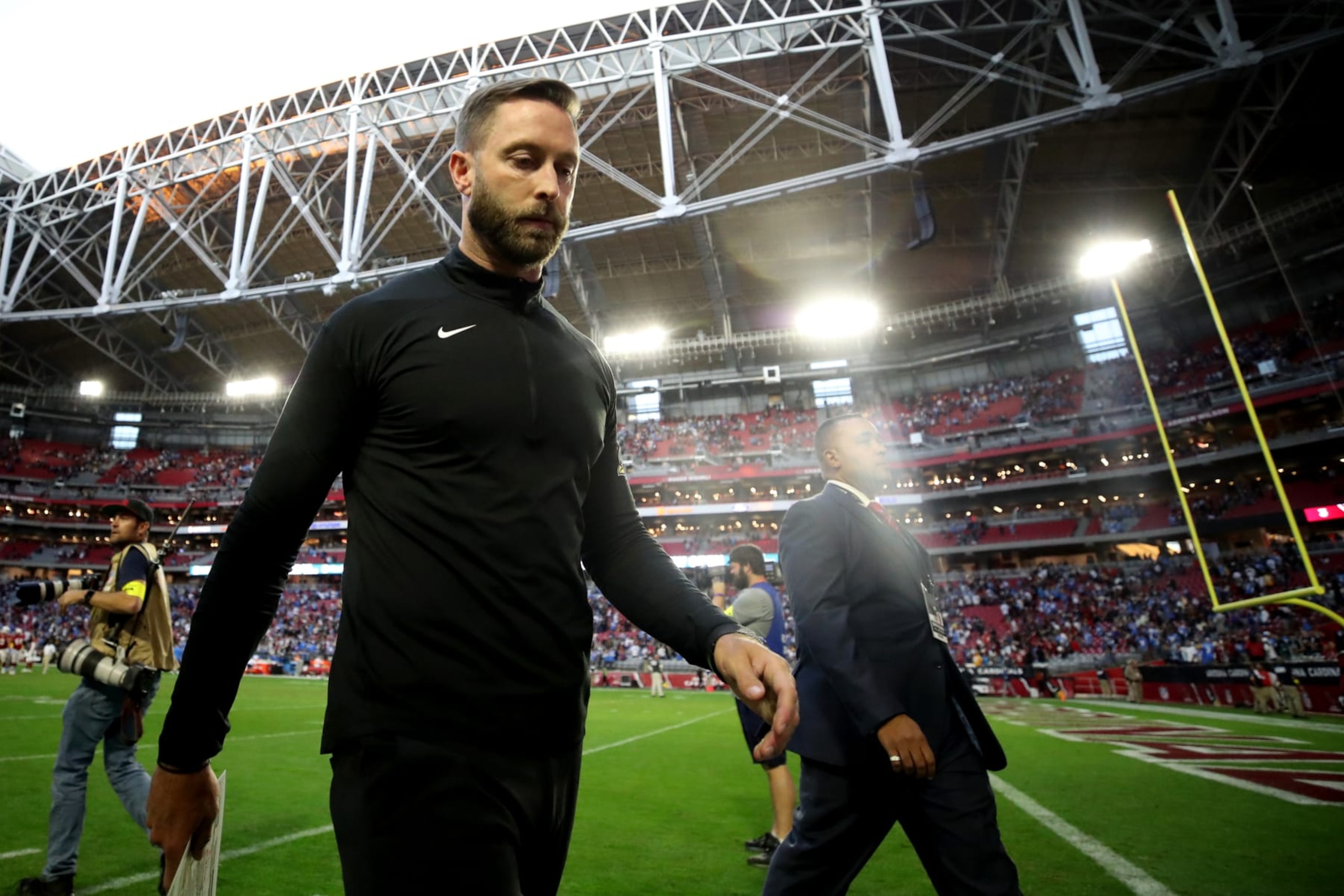 GLENDALE, ARIZONA - NOVEMBER 27: Head coach Kliff Kingsbury of the Arizona Cardinals walks off the field after a game against the Los Angeles Chargers at State Farm Stadium on November 27, 2022 in Glendale, Arizona. (Photo by Christian Petersen/Getty Images)