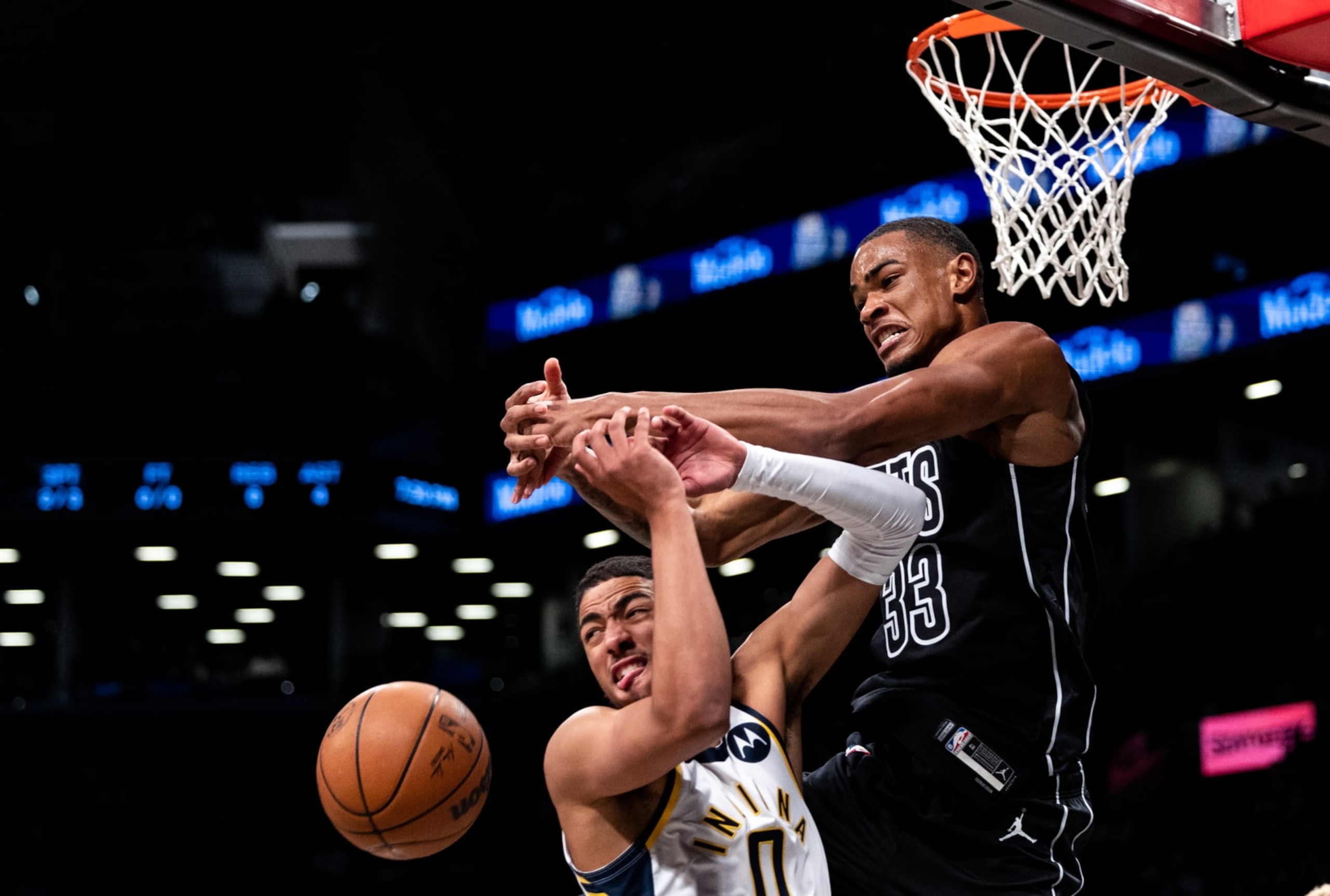 NEW YORK, NEW YORK - OCTOBER 31: Tyrese Haliburton #0 of the Indiana Pacers has a shot blocked by Nicolas Claxton #33 of the Brooklyn Nets during the first quarter of the game at Barclays Center on October 31, 2022 in New York City. NOTE TO USER: User expressly acknowledges and agrees that, by downloading and or using this photograph, User is consenting to the terms and conditions of the Getty Images License Agreement. (Photo by Dustin Satloff/Getty Images)