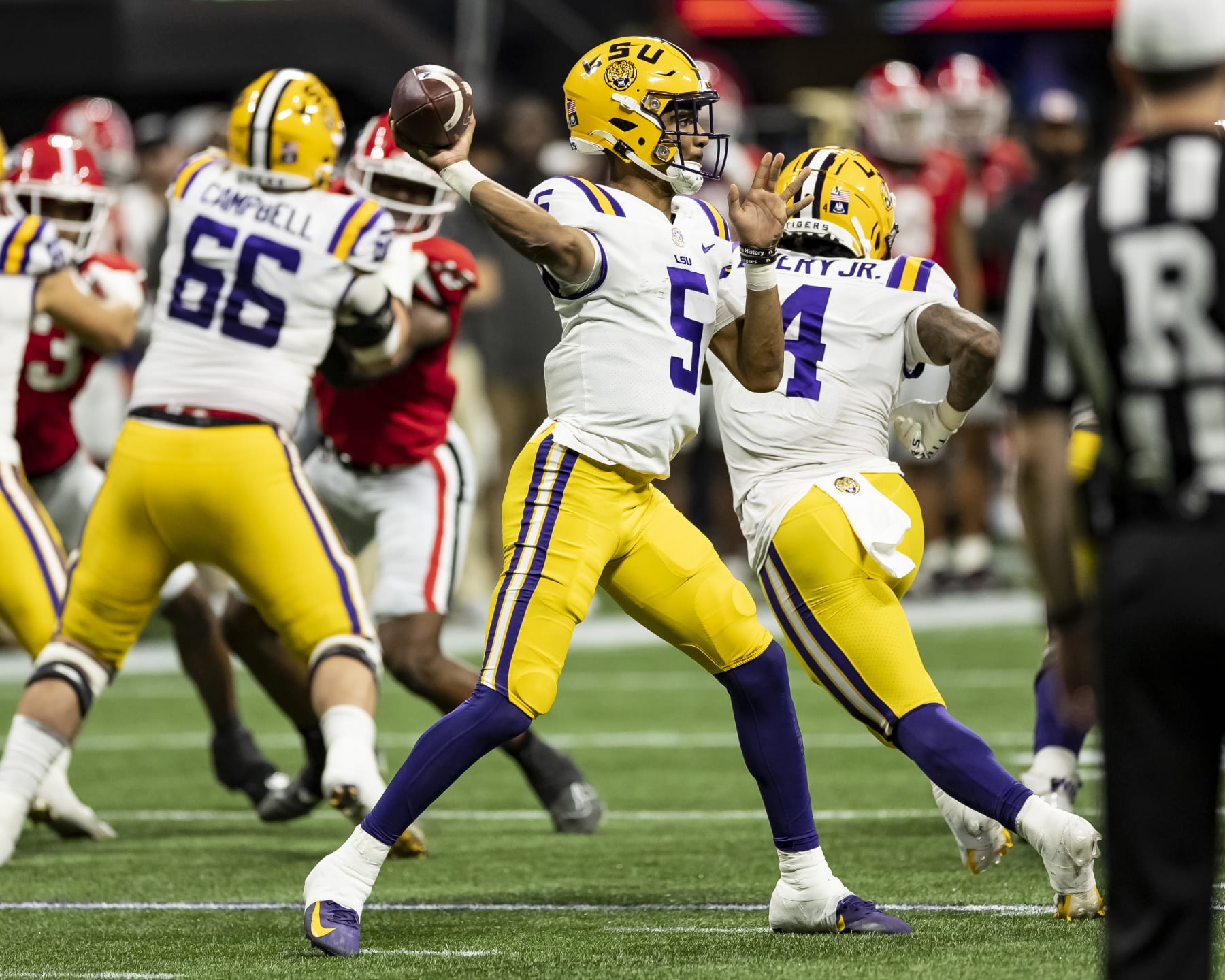 ATLANTA, GA - DECEMBER 3: Jayden Daniels #5 of the LSU Tigers passes the ball during a game between LSU Tigers and Georgia Bulldogs at Mercedes-Benz Stadium on December 3, 2022 in Atlanta, Georgia. (Photo by Steve Limentani/ISI Photos/Getty Images)