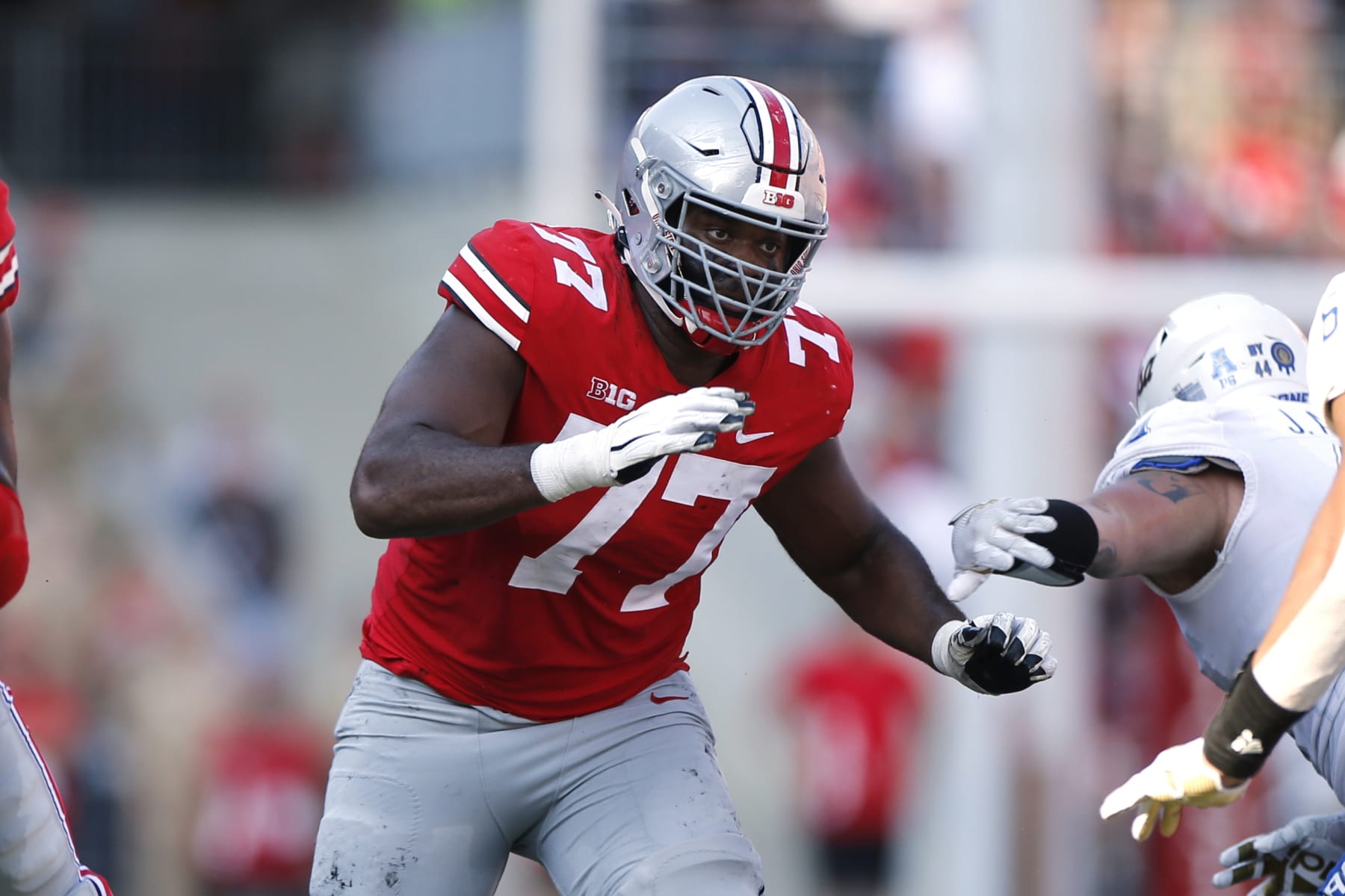 FILE - Ohio State offensive lineman Paris Johnson plays against Tulsa during an NCAA college football game Saturday, Sept. 18, 2021, in Columbus, Ohio. Johnson was named to The Associated Press preseason All-America team, Monday, Aug. 22, 2022. (AP Photo/Jay LaPrete, File)