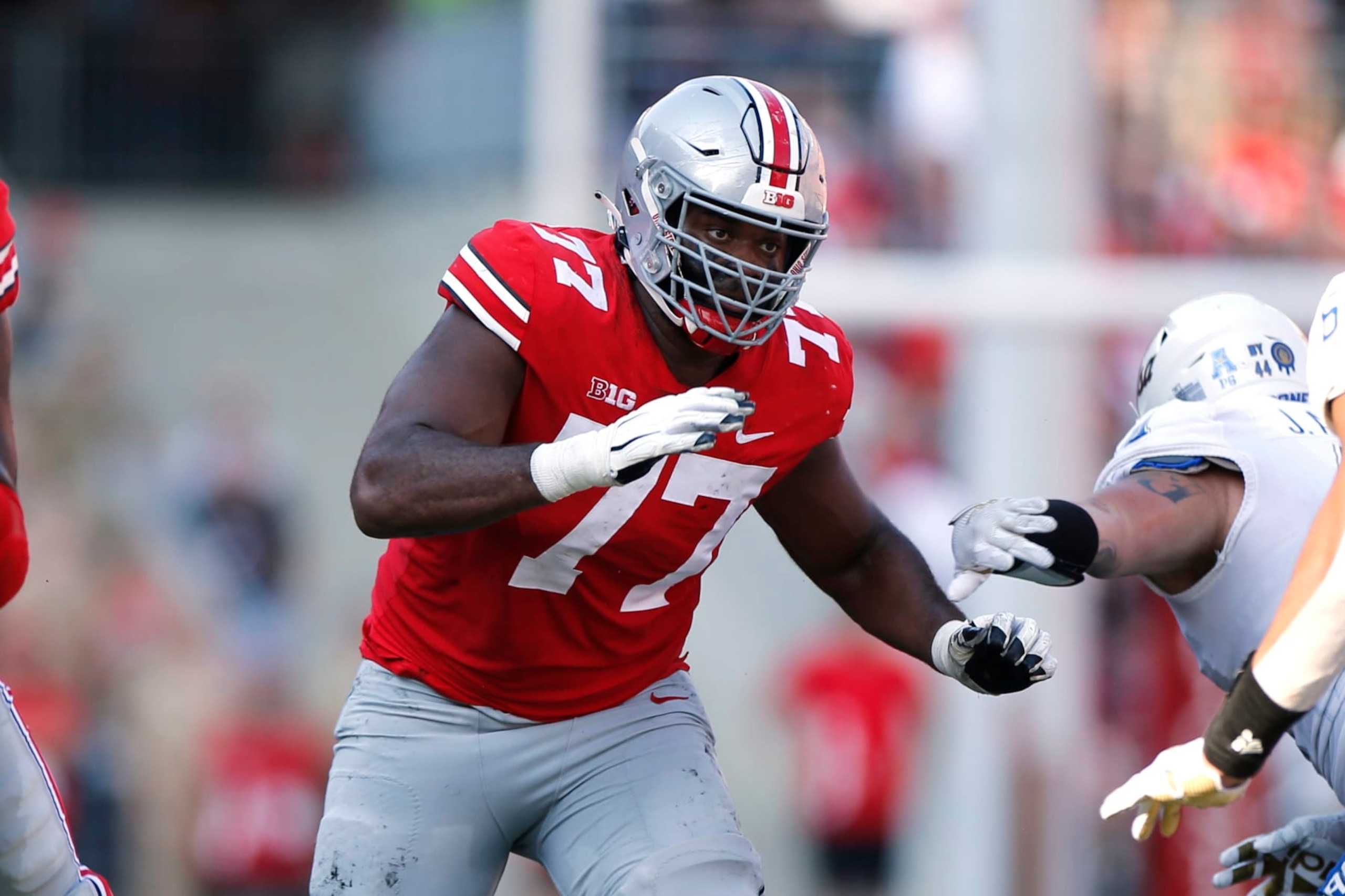 FILE - Ohio State offensive lineman Paris Johnson plays against Tulsa during an NCAA college football game Saturday, Sept. 18, 2021, in Columbus, Ohio. Johnson was named to The Associated Press preseason All-America team, Monday, Aug. 22, 2022. (AP Photo/Jay LaPrete, File)