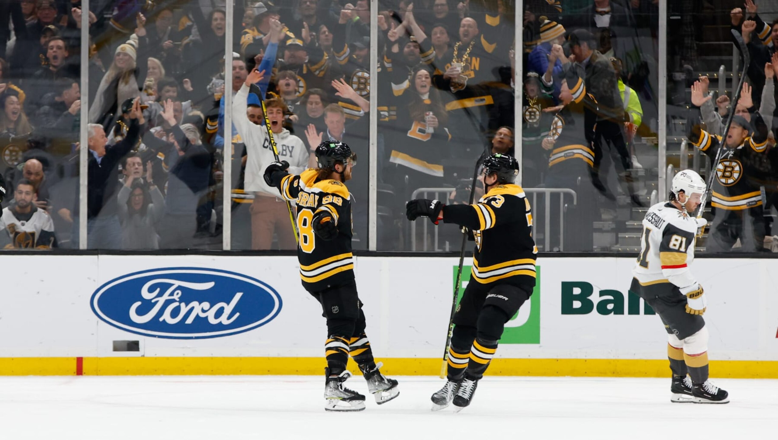 BOSTON, MA - DECEMBER 5: David Pastrnak #88 of the Boston Bruins celebrates his goal with teammate Charlie McAvoy #73 against the Vegas Golden Knights during the second period at the TD Garden on December 5, 2022 in Boston, Massachusetts. (Photo by Richard T Gagnon/Getty Images)