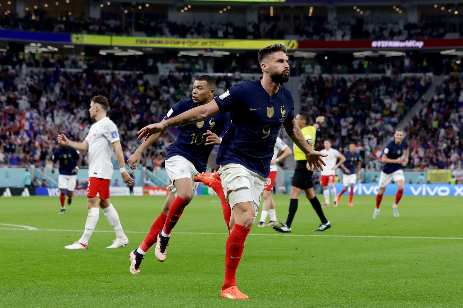 DOHA, QATAR - DECEMBER 4: Oliver Giroud of France celebrates 1-0 with Kylian Mbappe of France  during the  World Cup match between France  v Poland at the Al Thumama Stadium on December 4, 2022 in Doha Qatar (Photo by Eric Verhoeven/Soccrates/Getty Images)