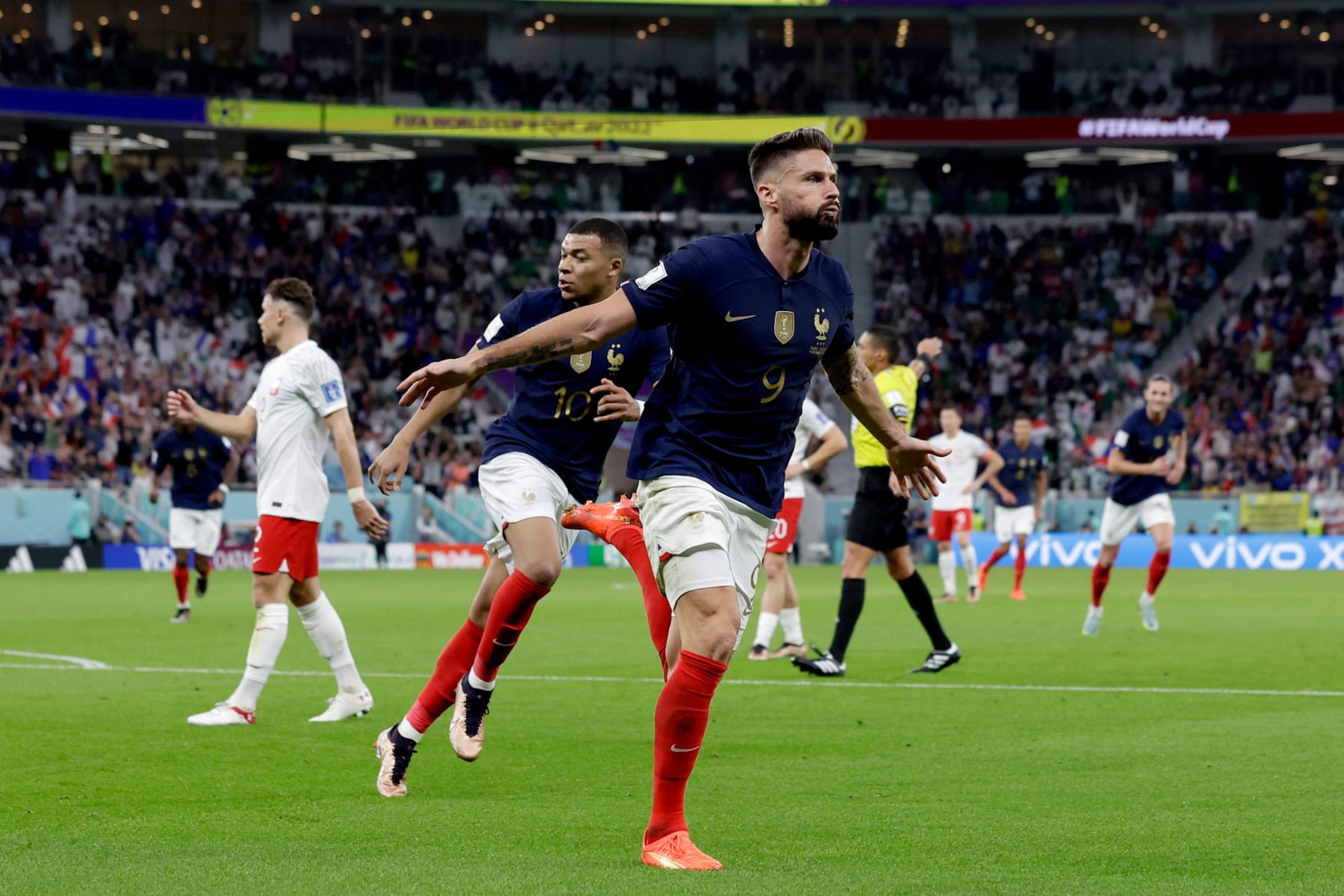 DOHA, QATAR - DECEMBER 4: Oliver Giroud of France celebrates 1-0 with Kylian Mbappe of France  during the  World Cup match between France  v Poland at the Al Thumama Stadium on December 4, 2022 in Doha Qatar (Photo by Eric Verhoeven/Soccrates/Getty Images)